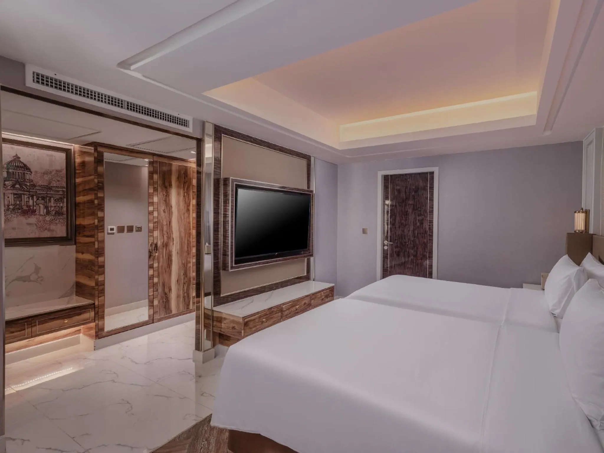 Communal lounge/ TV room, Bed in Aira Hotel Bangkok Sukhumvit 11