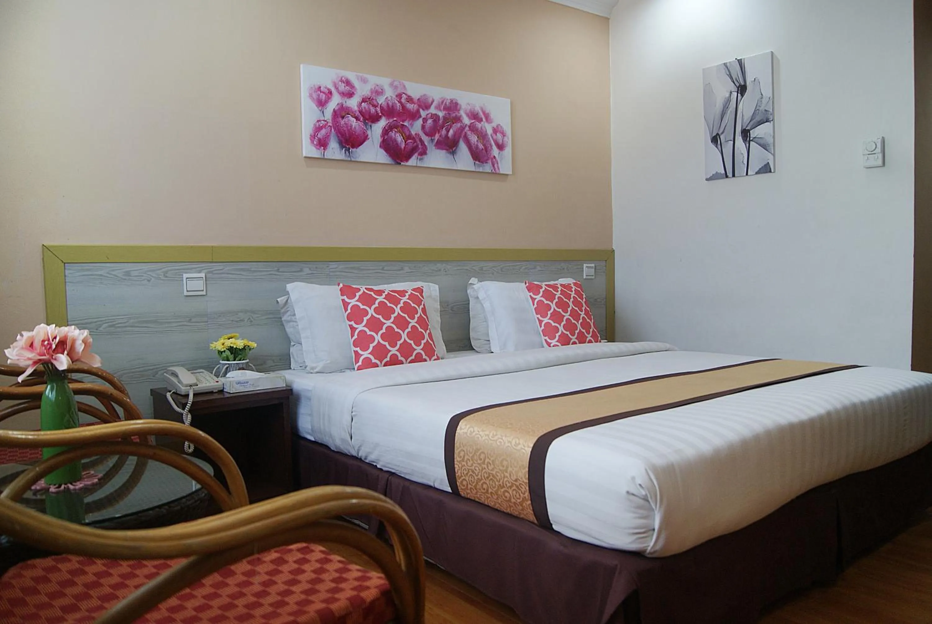 Bed in TD Plaza Hotel