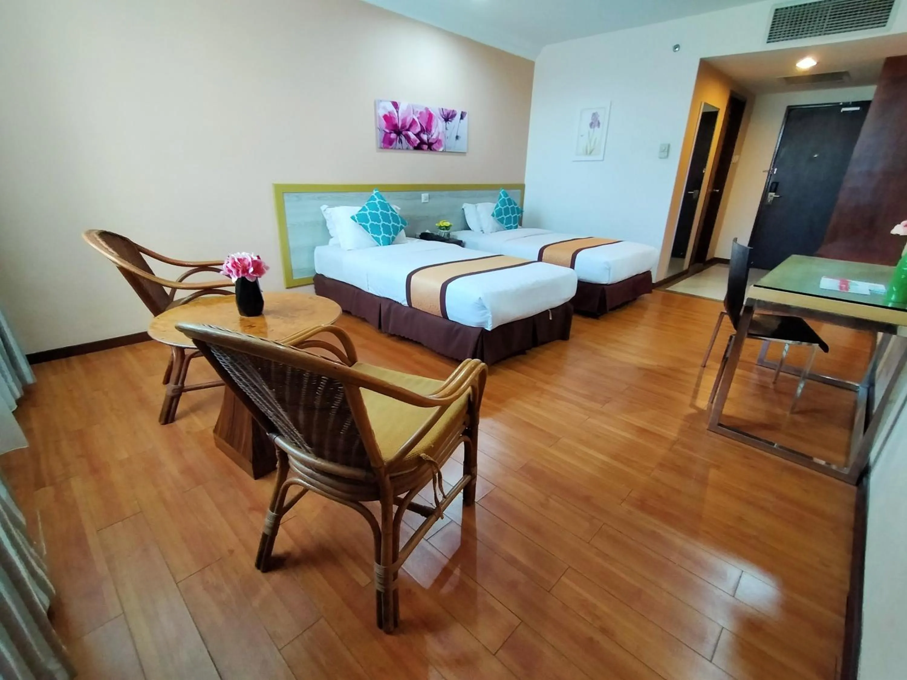 Bed in TD Plaza Hotel