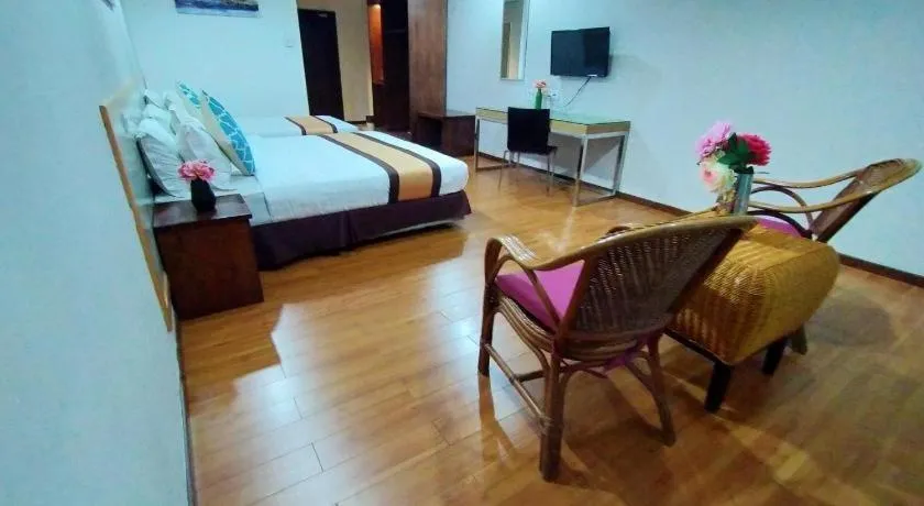 Bed in TD Plaza Hotel