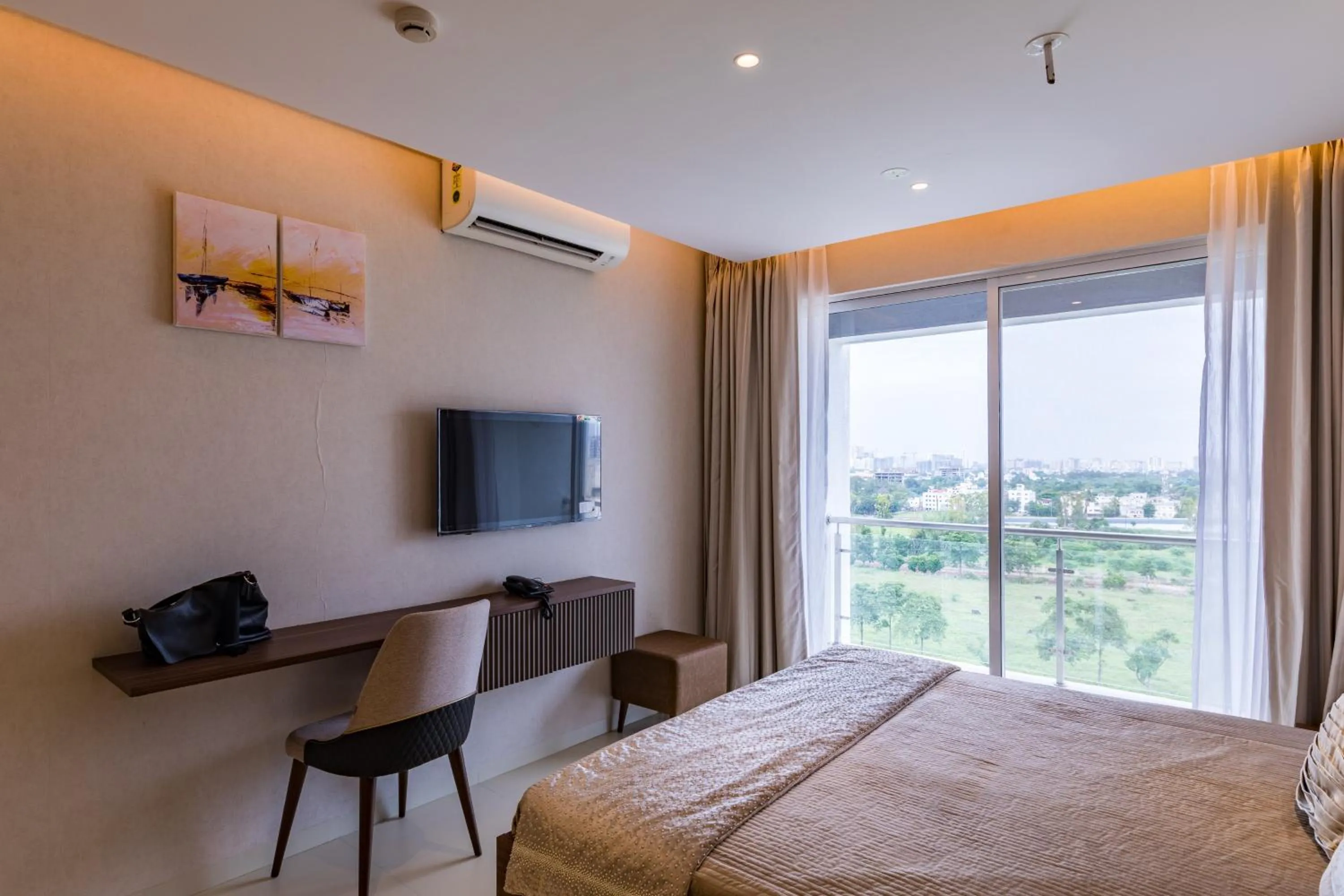 Communal lounge/ TV room, Bed in AR Suites Jewels Royale - Koregaon Park NX