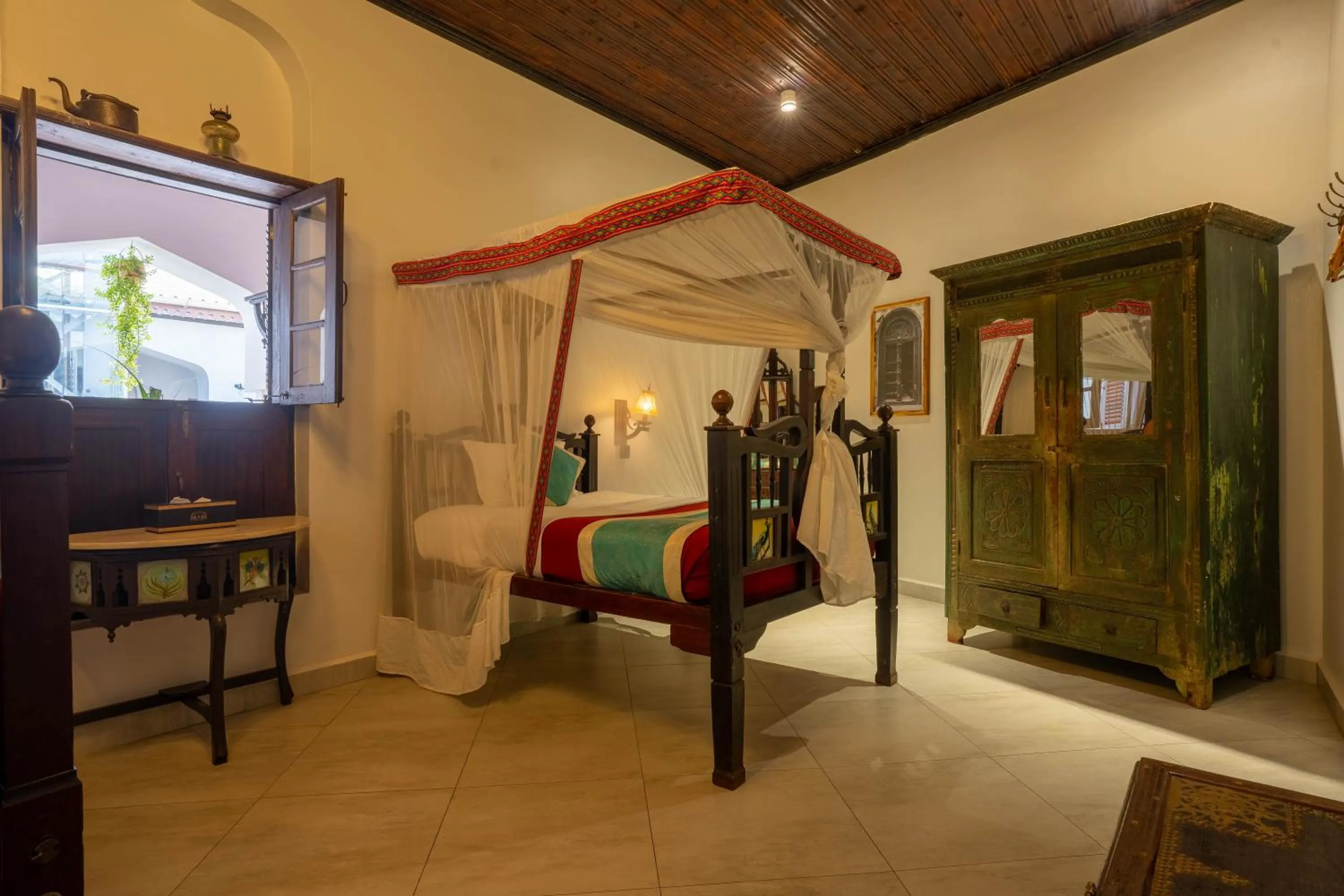 Bed in Dhow Palace Hotel