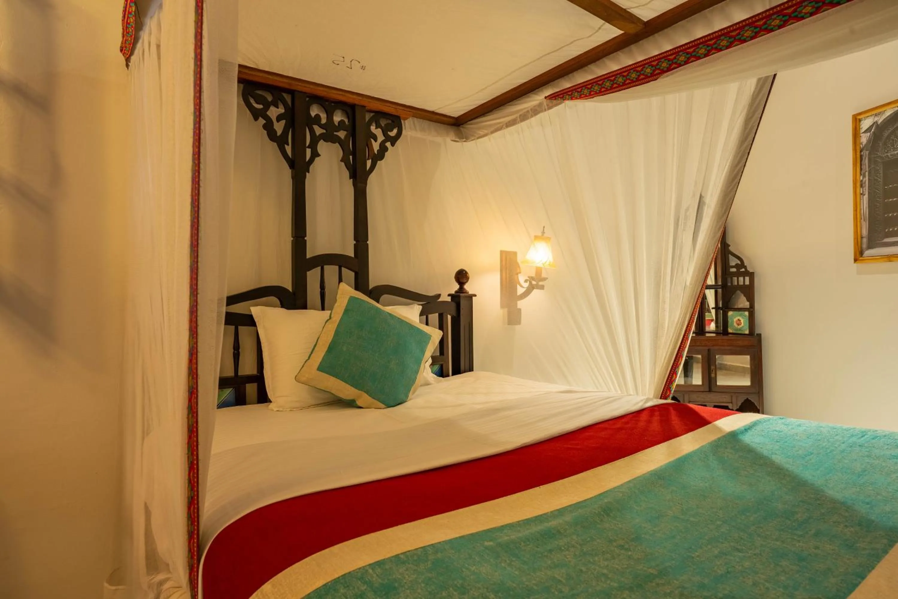 Bed in Dhow Palace Hotel
