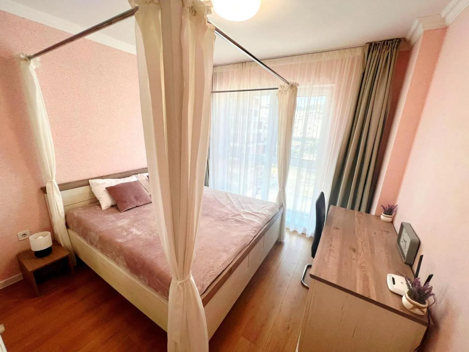 Bed in PAPAYA APARTMENTS