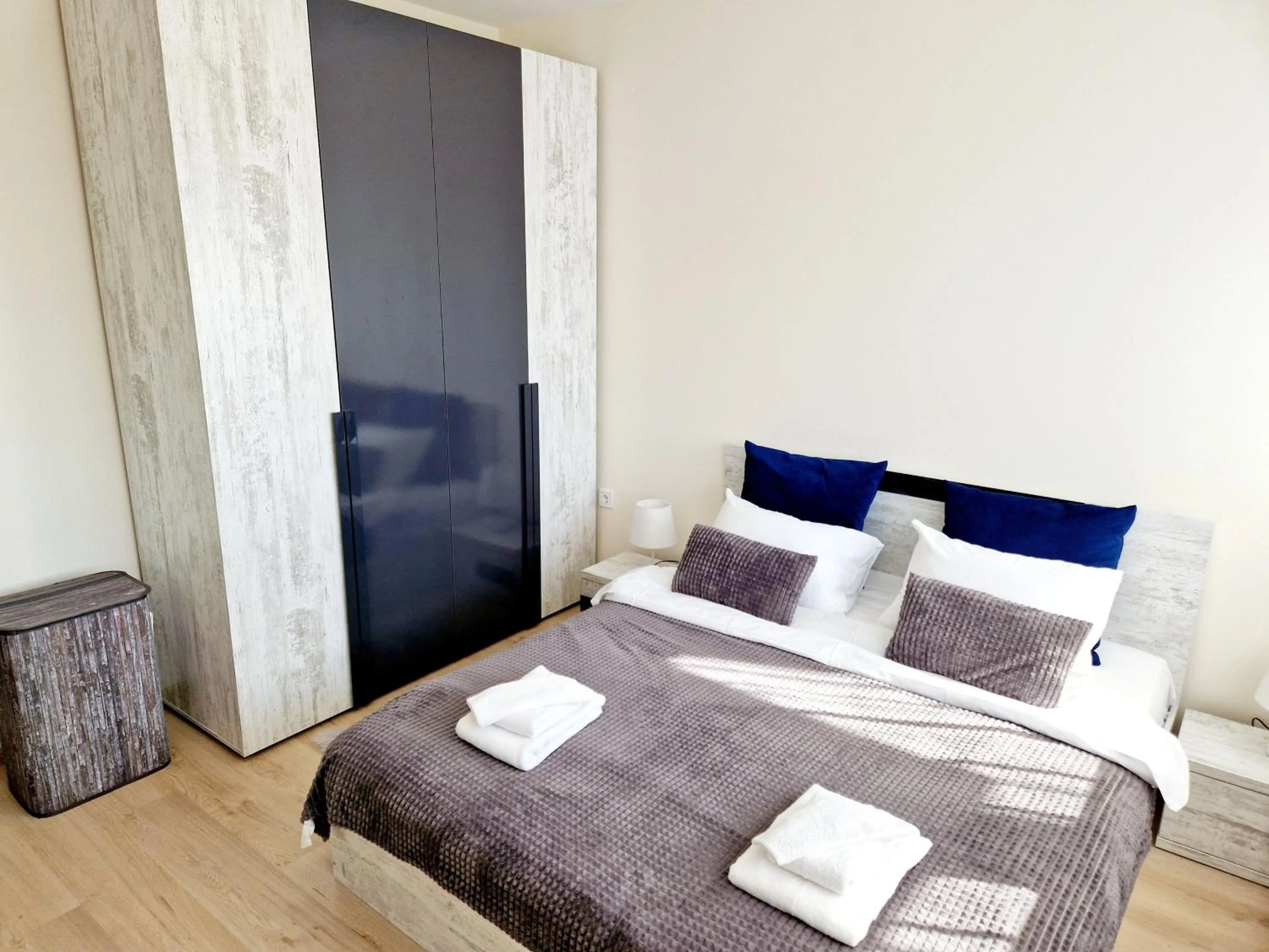 Bed in PAPAYA APARTMENTS