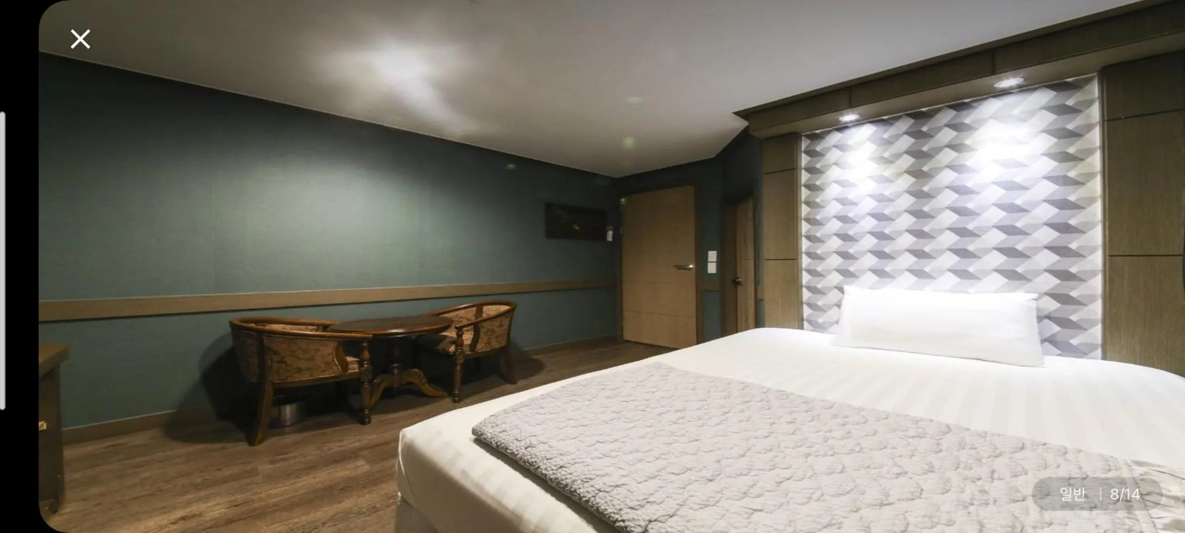 Seating area, Bed in Hotel Q Chuncheon