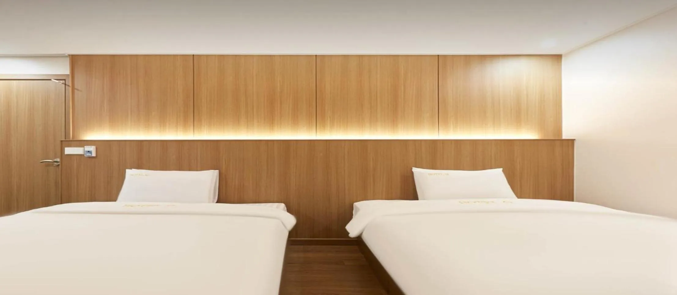 Bed in Hotel Q Chuncheon