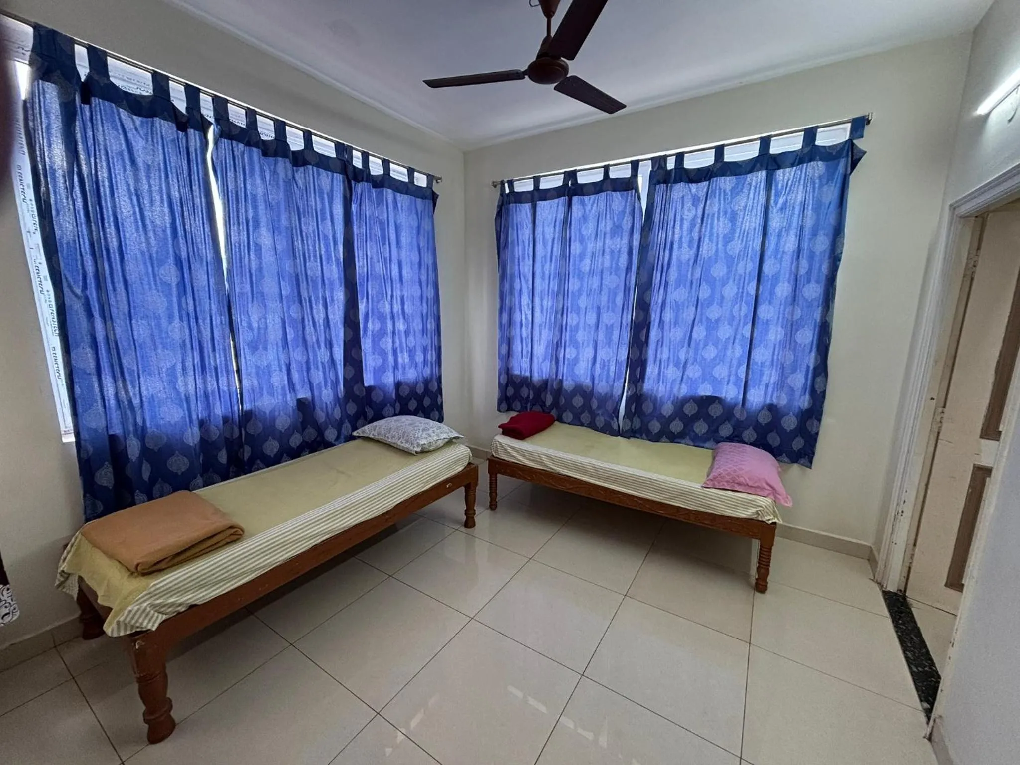 Bed in Srinivasa Hotel