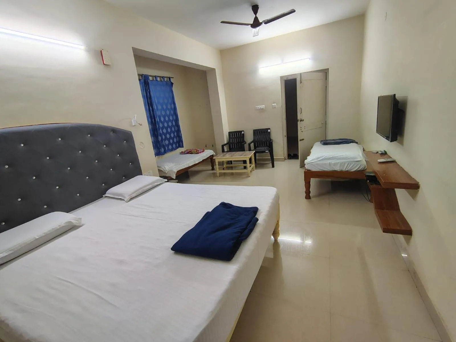 Bed in Srinivasa Hotel
