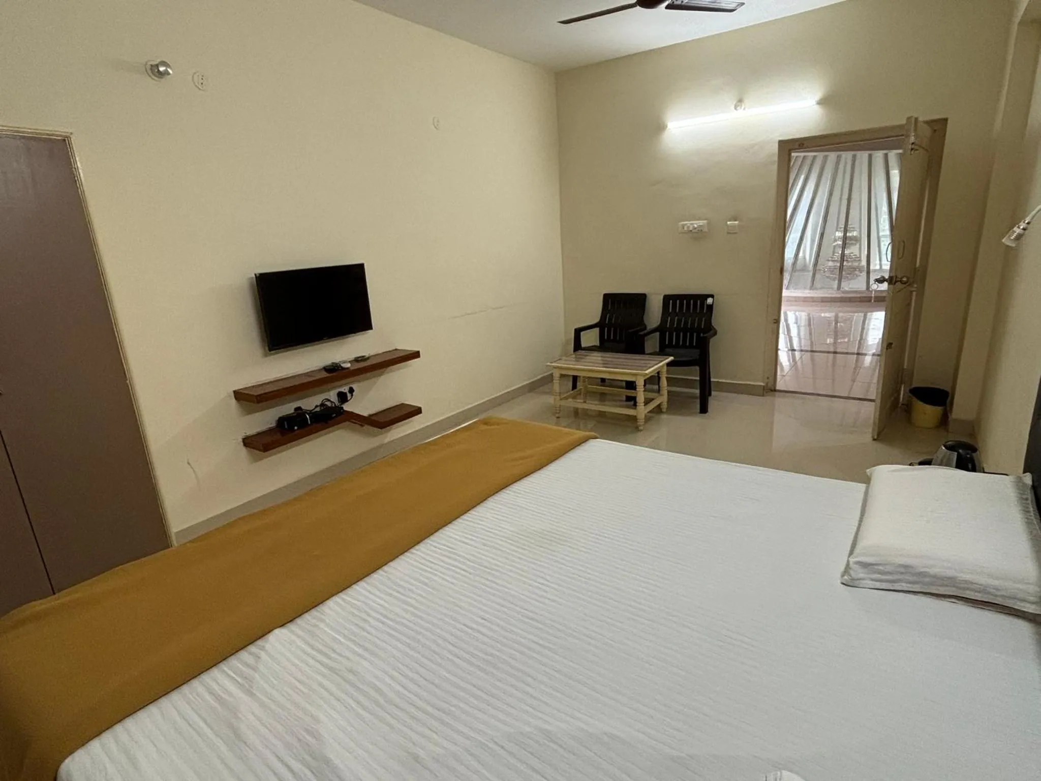 Bed in Srinivasa Hotel