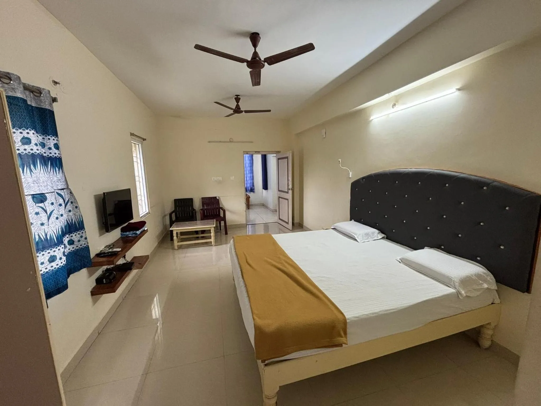 Bed in Srinivasa Hotel