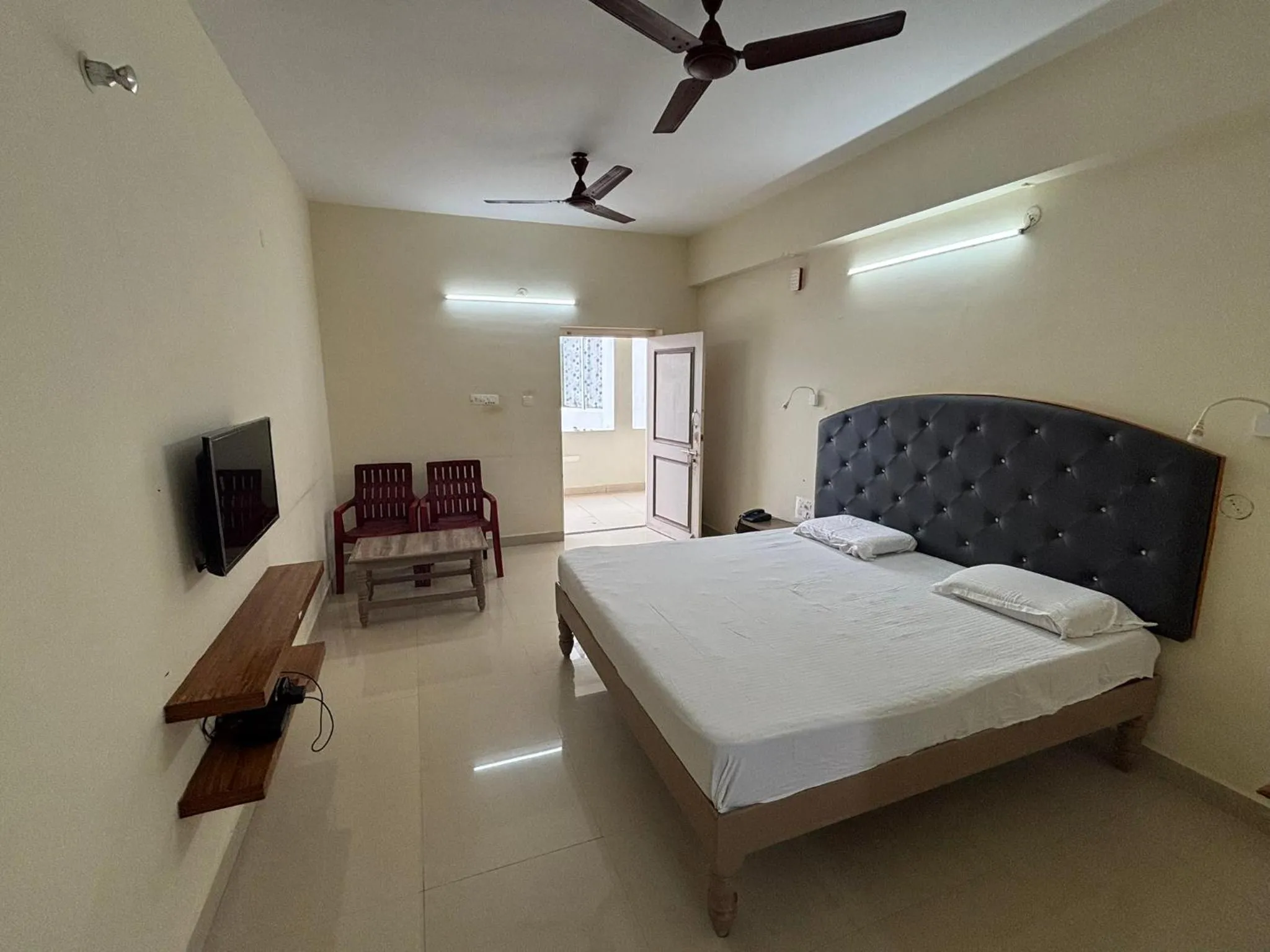 Bed in Srinivasa Hotel