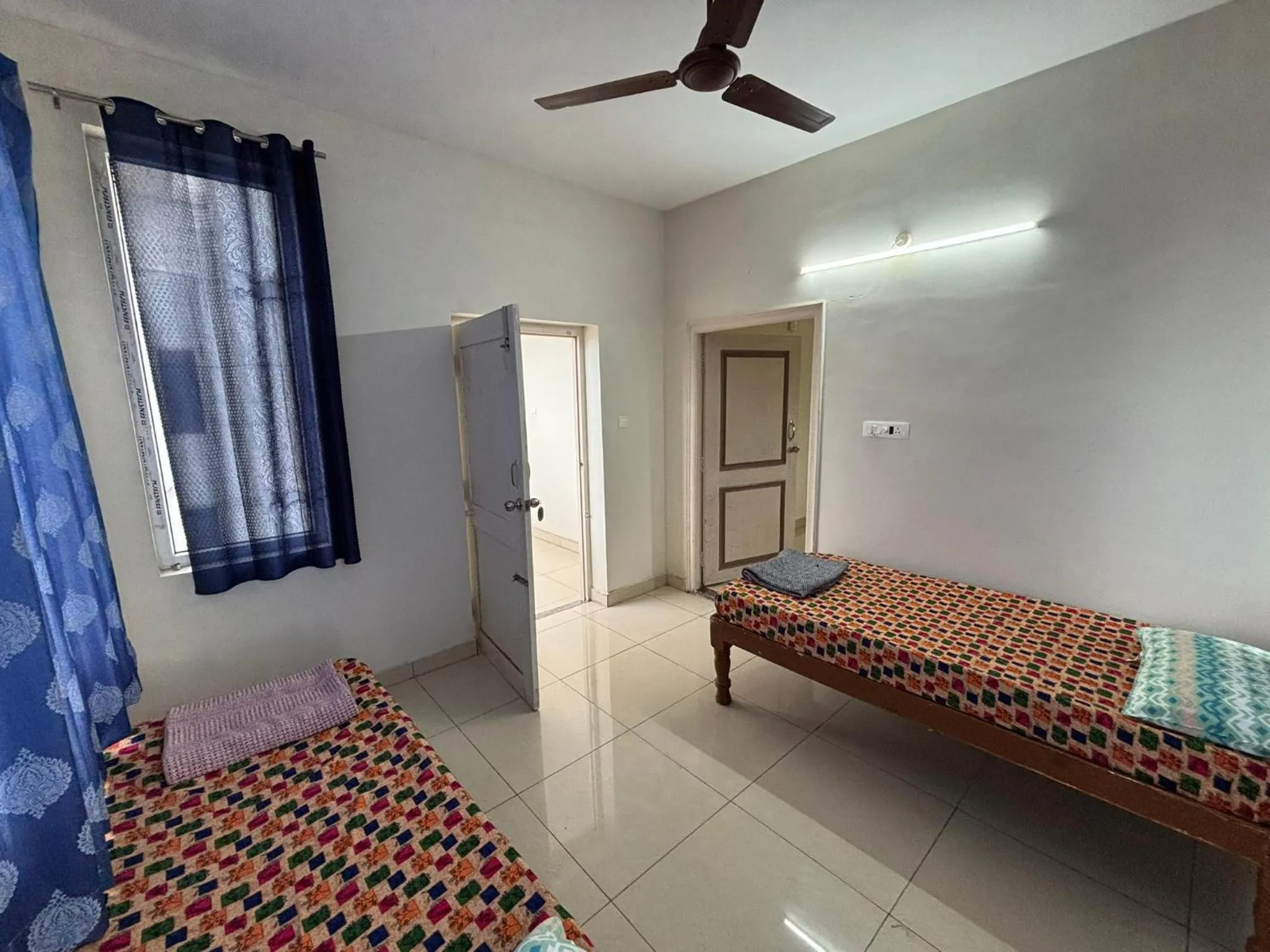 Bed in Srinivasa Hotel