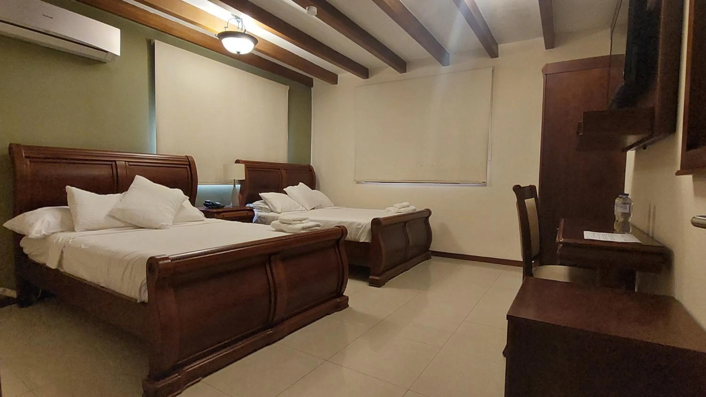 Bed in Hotel Voyager Manta