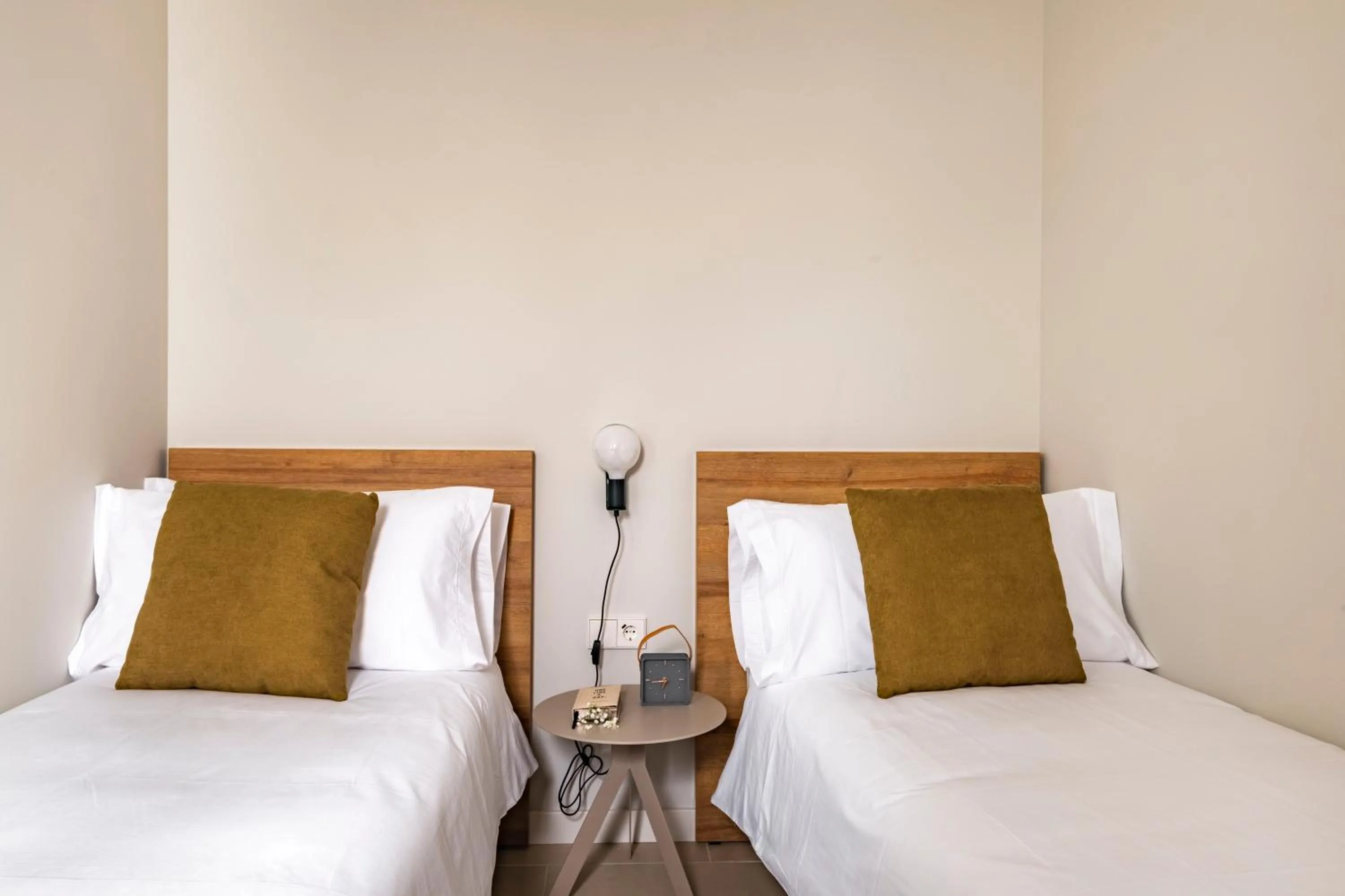 Bedroom, Bed in Aspasios Garden Apartments