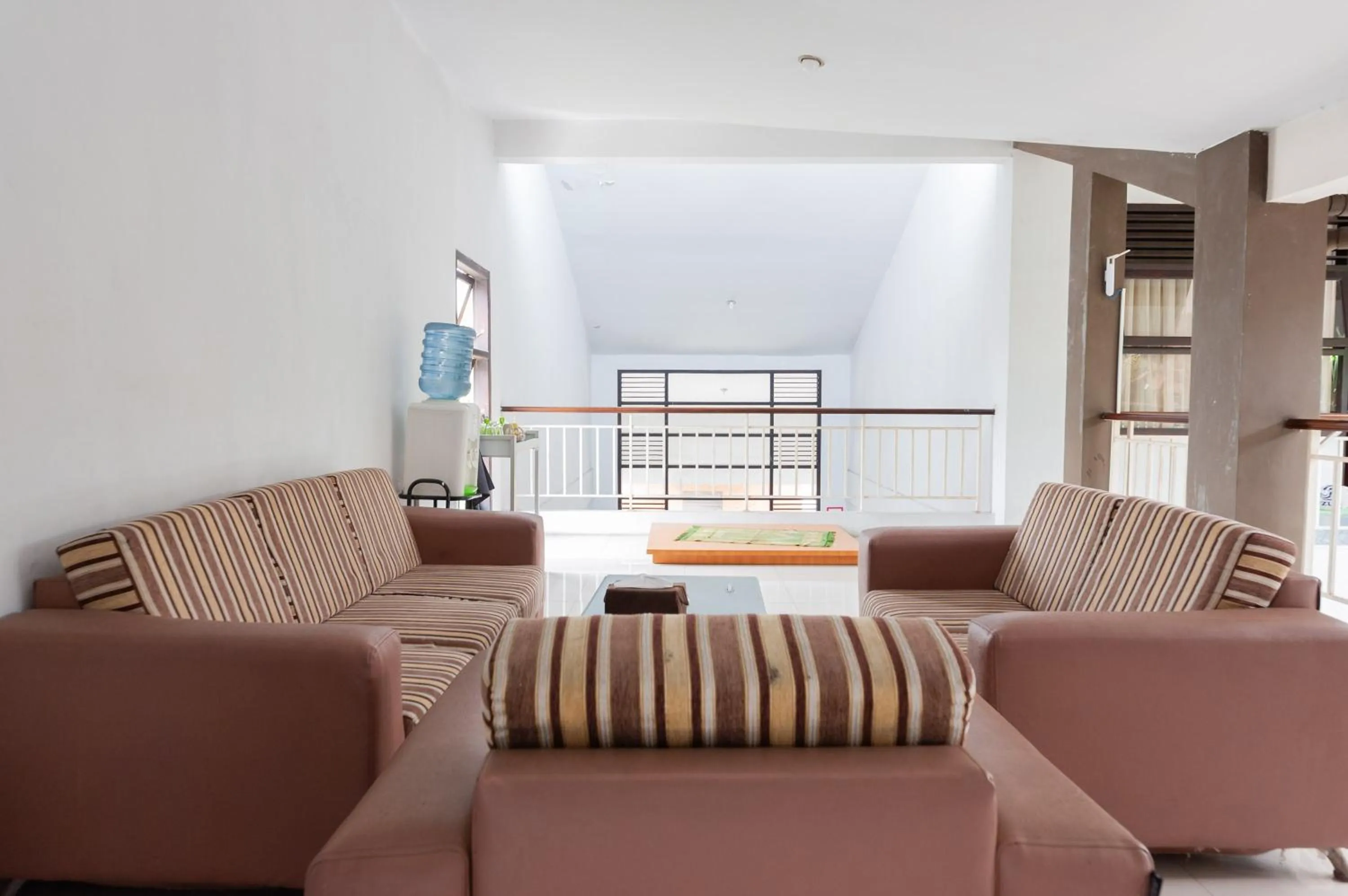 Seating area in RedDoorz Syariah near Banda Aceh Convention Hall