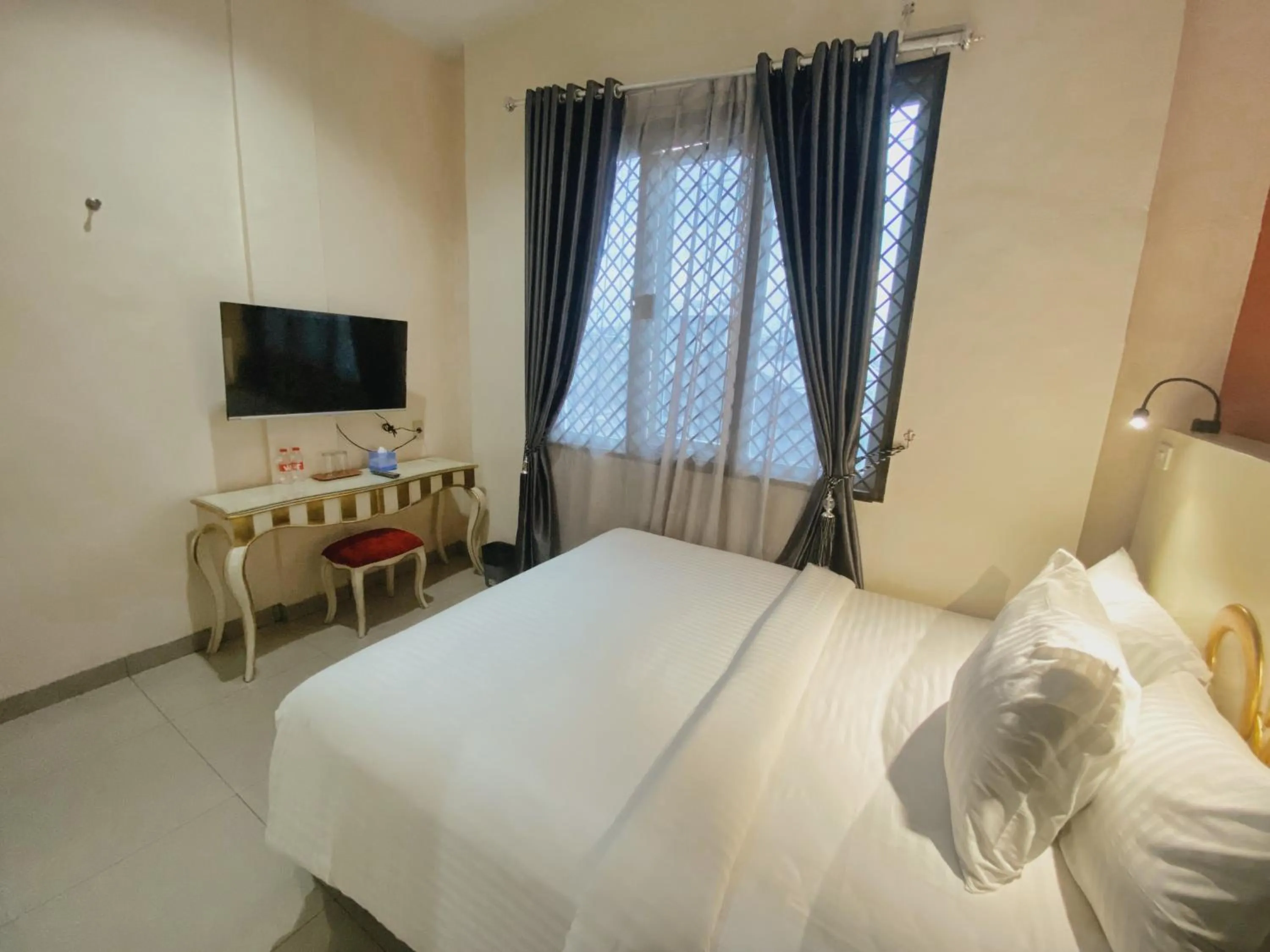 Bed in JIYO BOUTIQUE Hotel