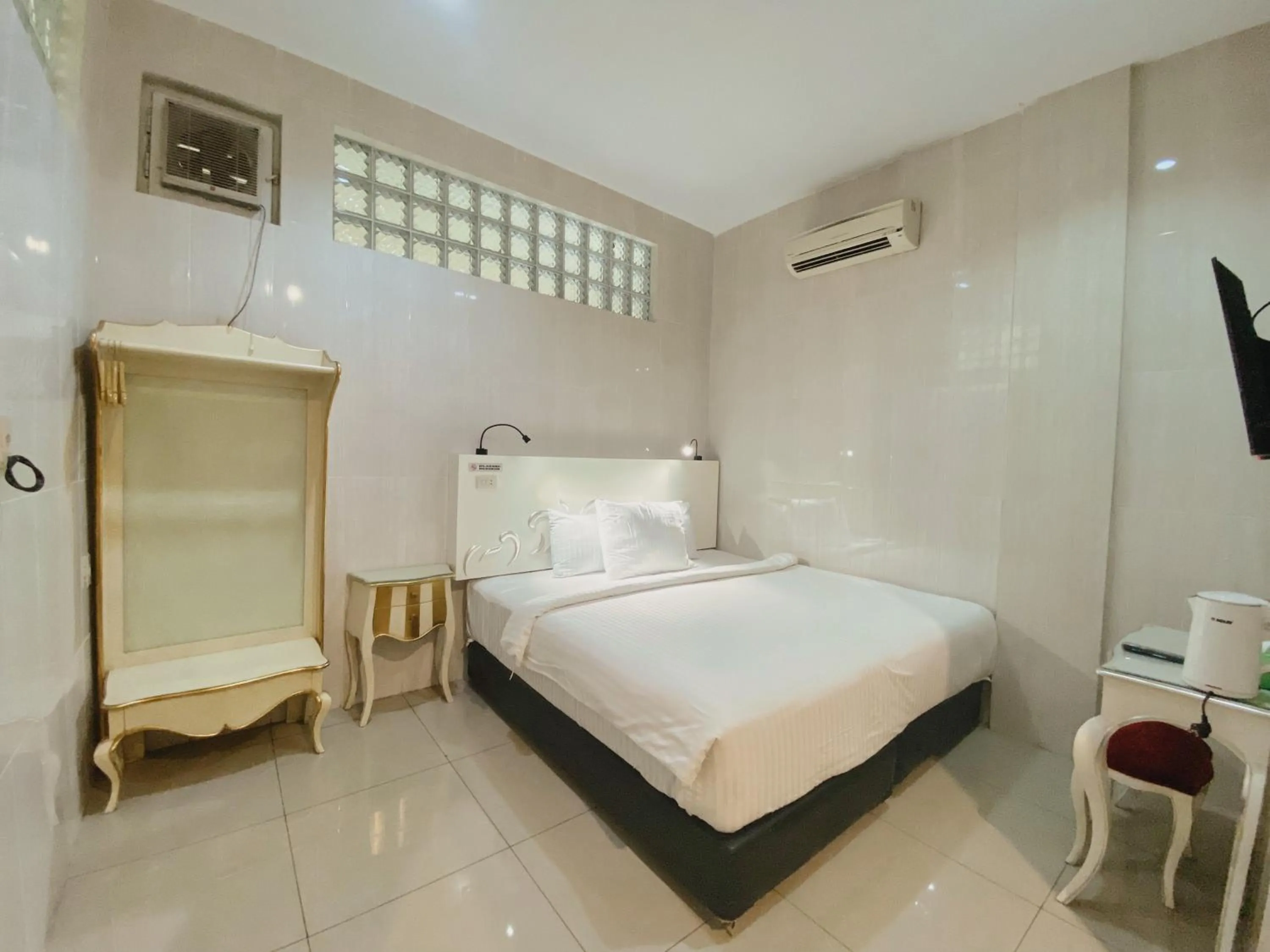 Bed in JIYO BOUTIQUE Hotel