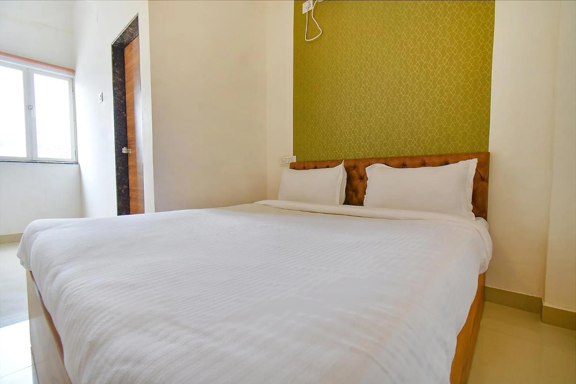 Bed in Via Tiru Residency