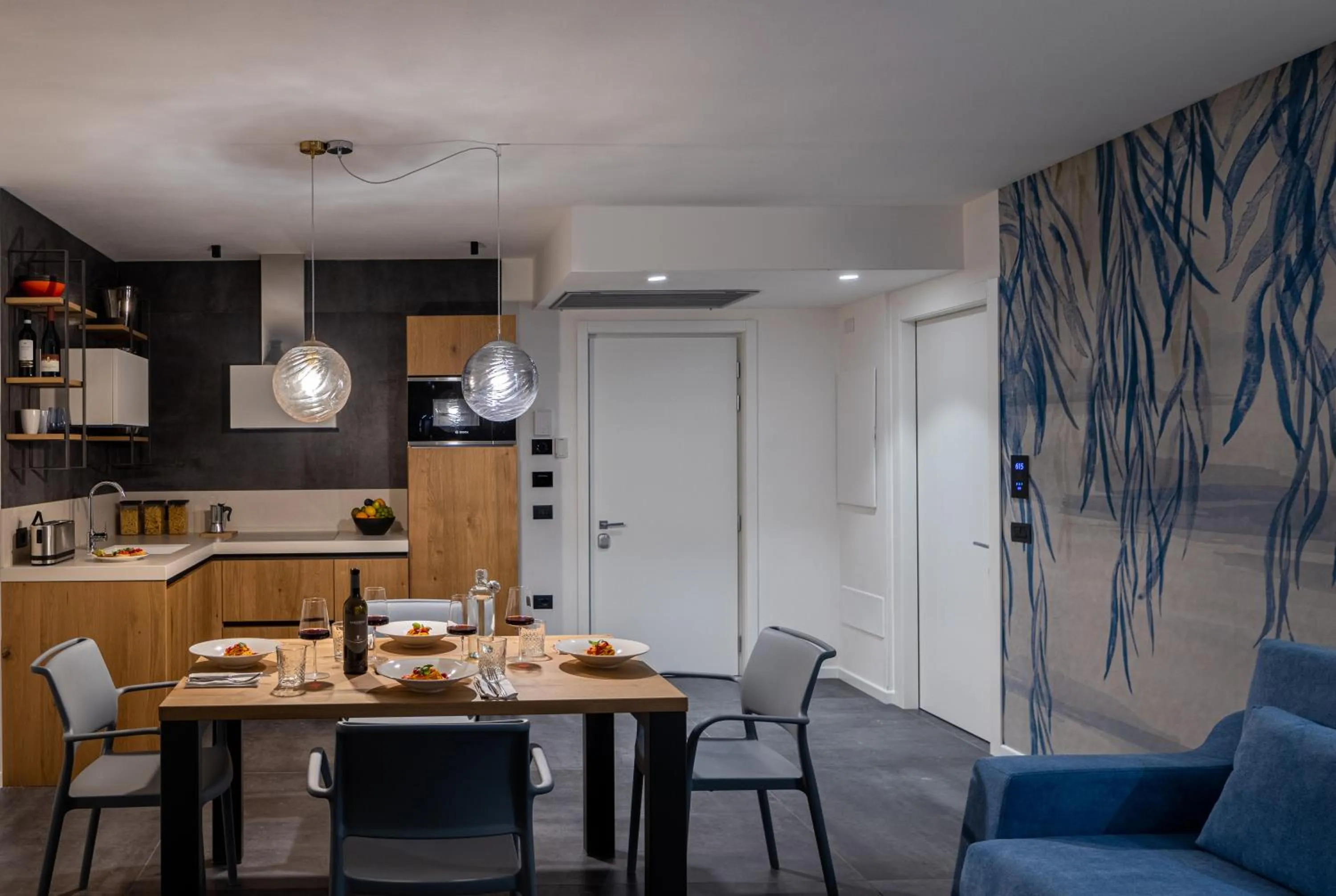 Kitchen or kitchenette in Aris Apartments & Sky Pool - Tonelli Hotels - Adult Friendly