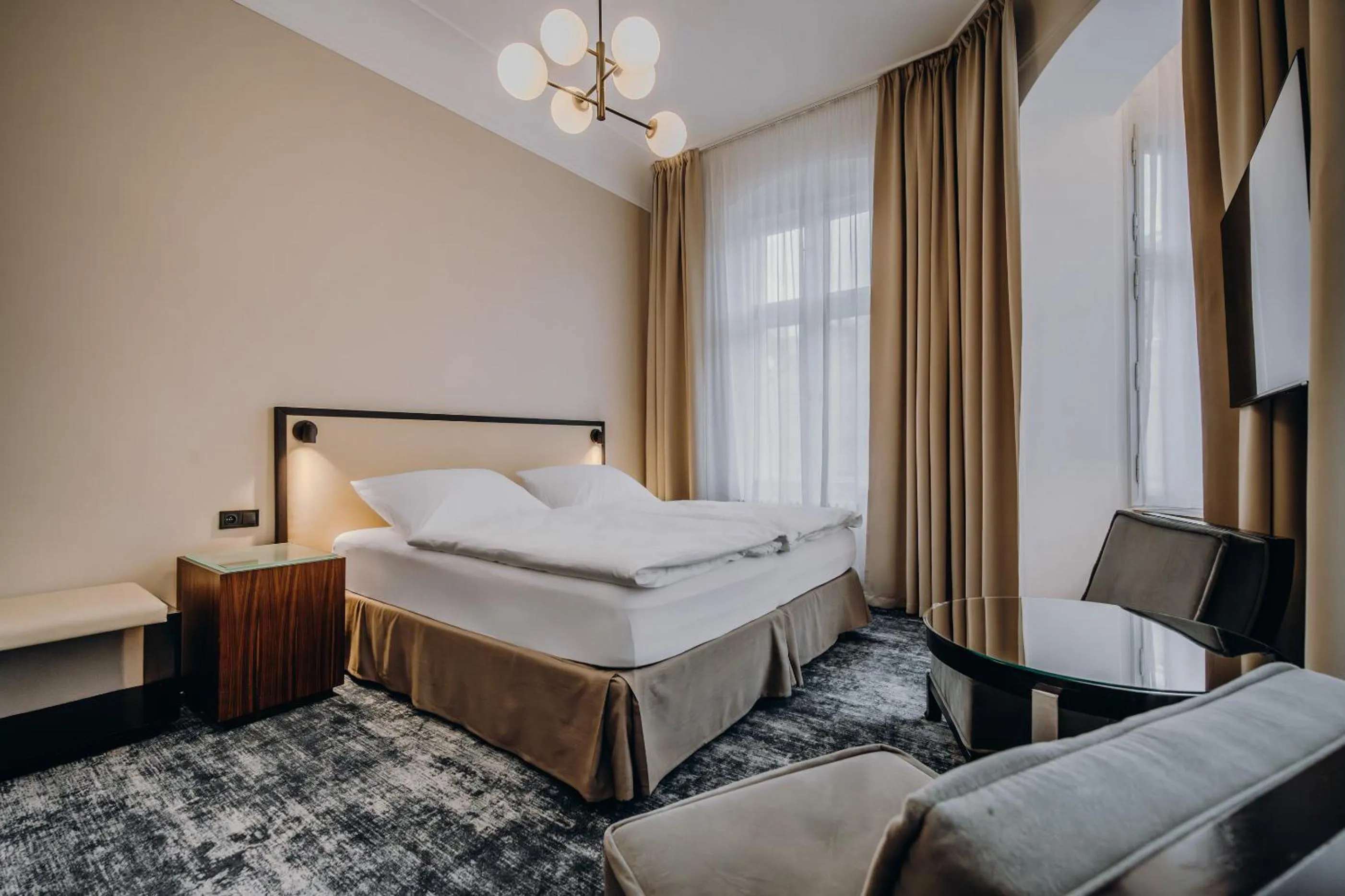 Bed in Esplanade Self Check-in Hotel