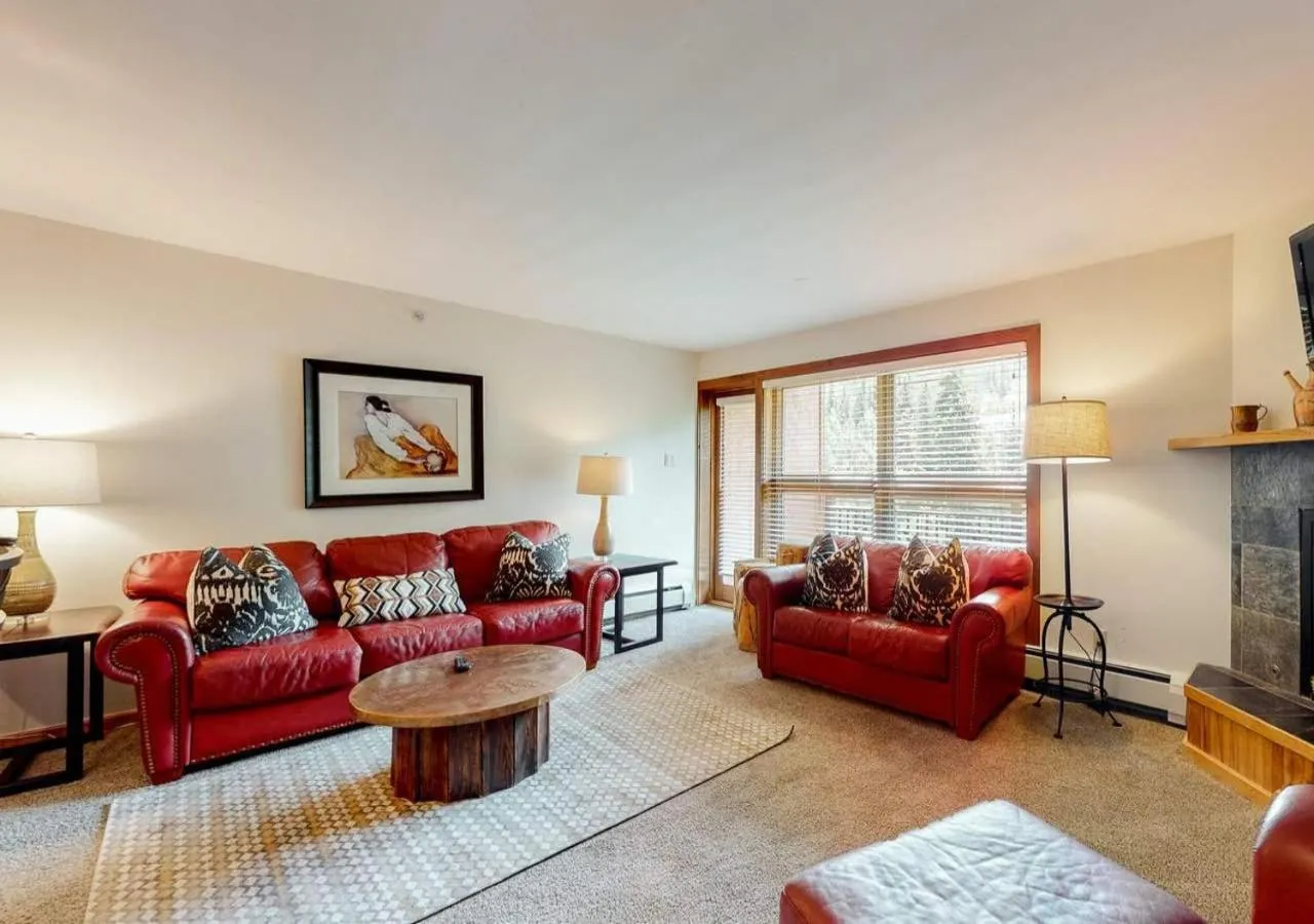 Living room in Lion Square Lodge Condos by TO