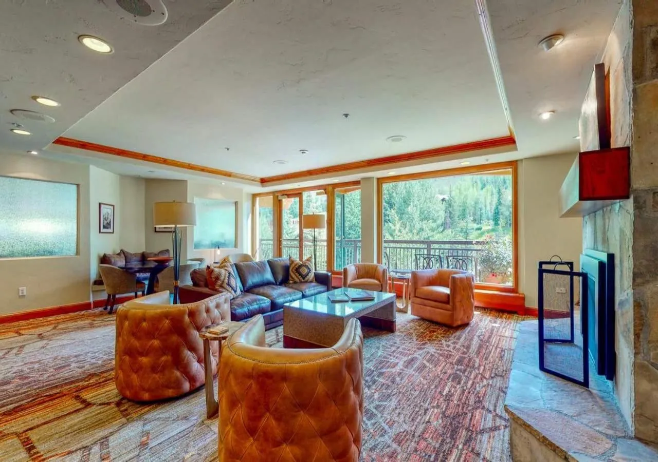 Living room in Lion Square Lodge Condos by TO