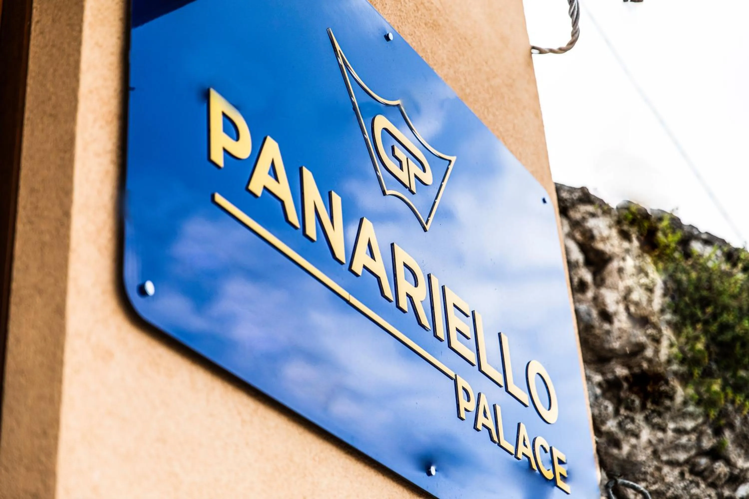 Property logo or sign in Panariello Palace
