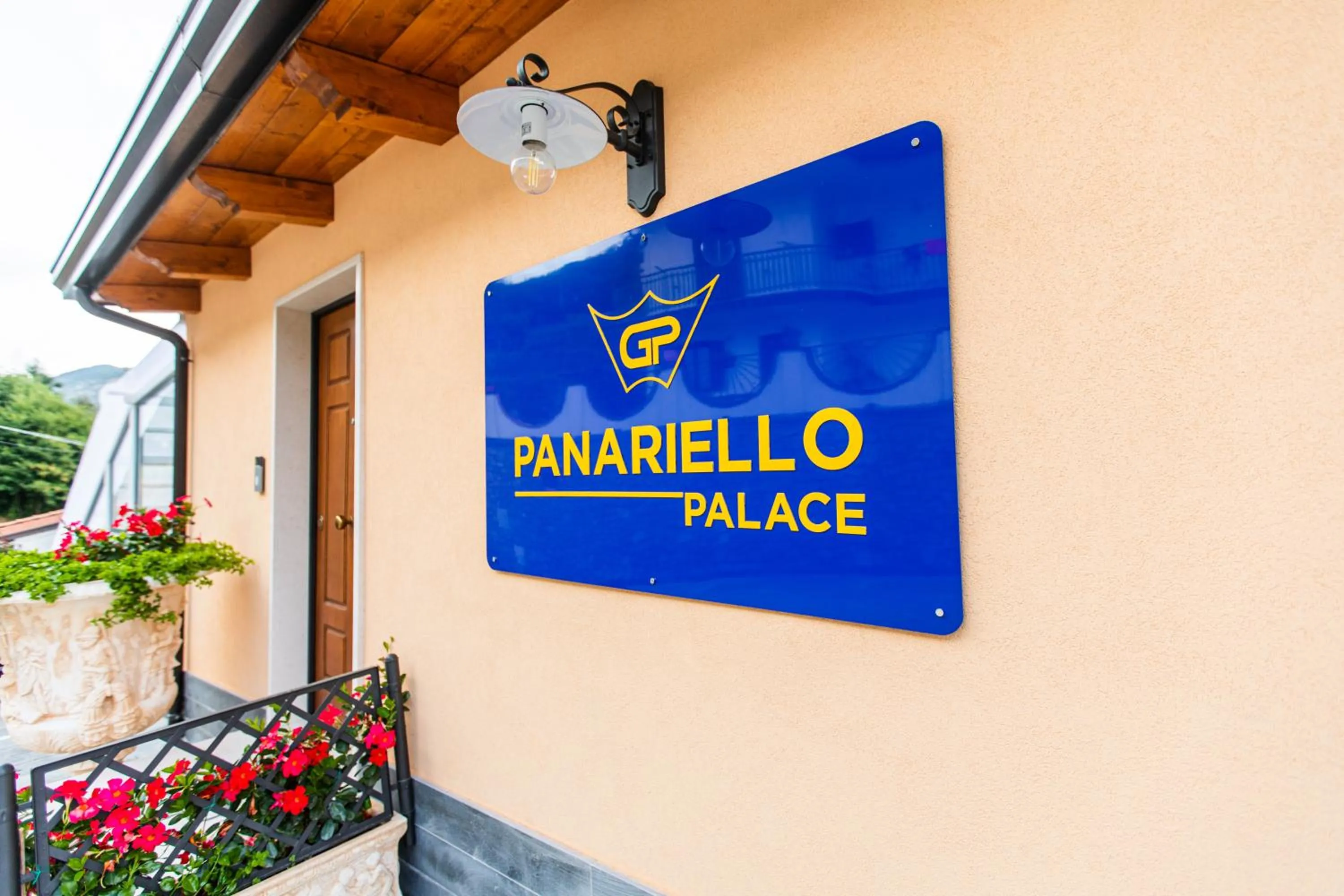 Property logo or sign in Panariello Palace