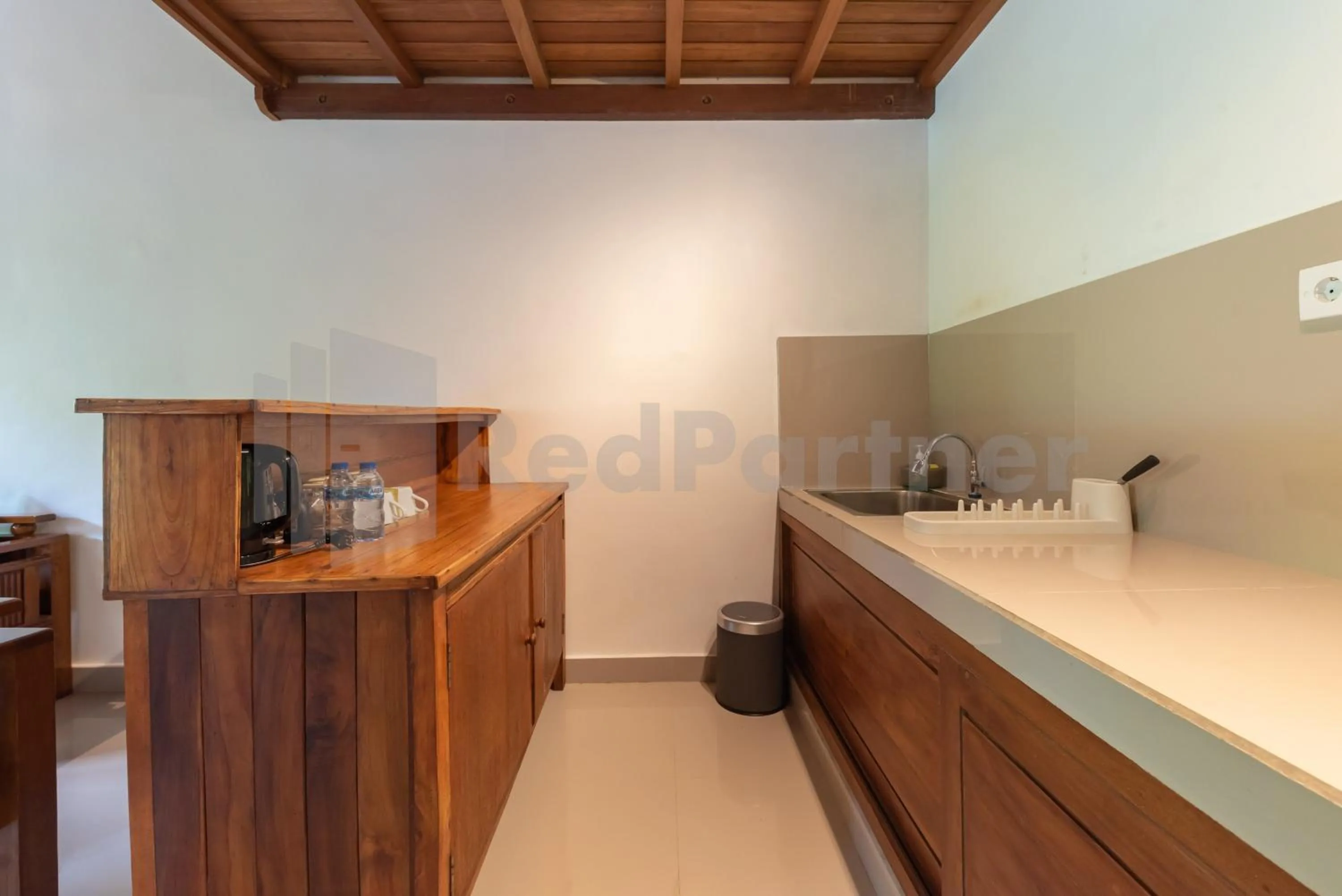 Kitchen or kitchenette in Brisk Homestay Uluwatu RedPartner