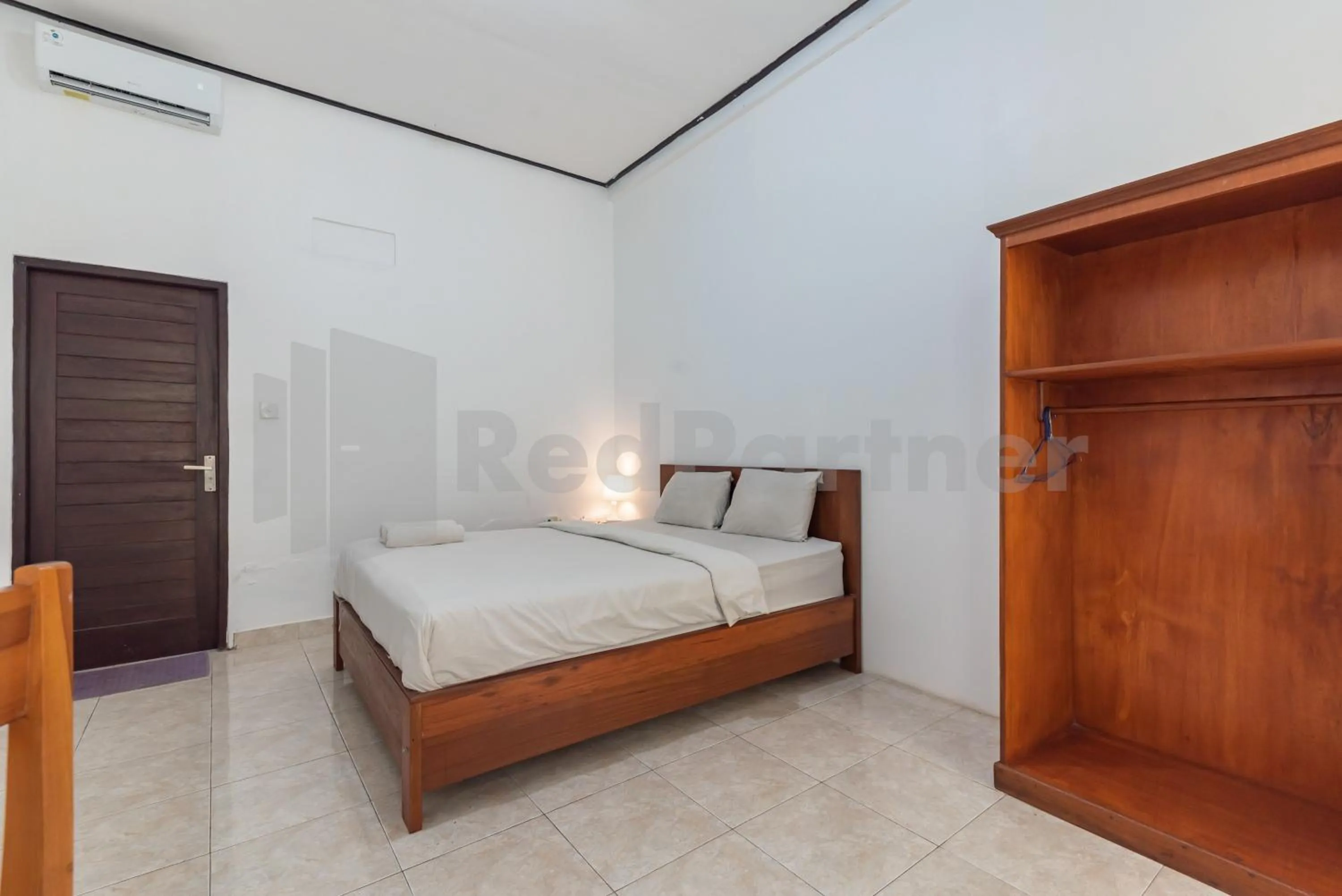 Bedroom, Bed in Brisk Homestay Uluwatu RedPartner