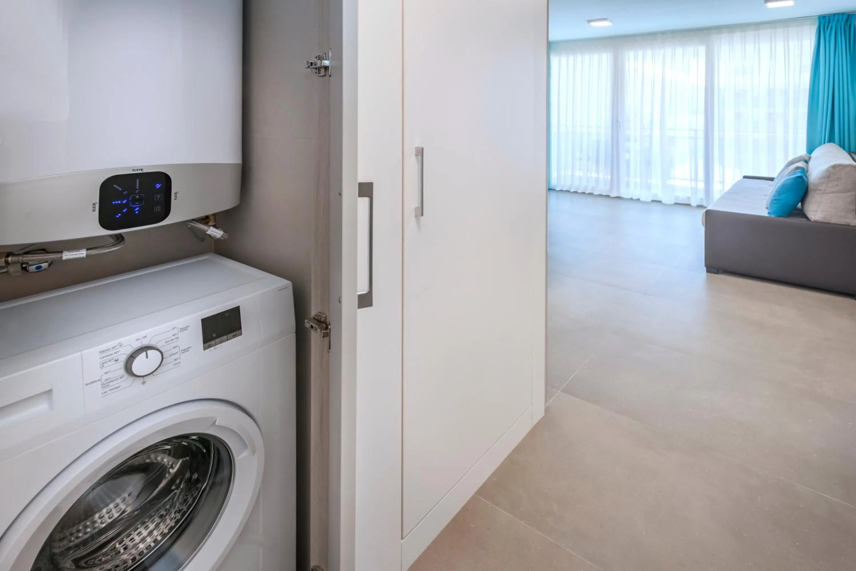 TV and multimedia in Rentalmar Salou Playa Family Suites & Pool