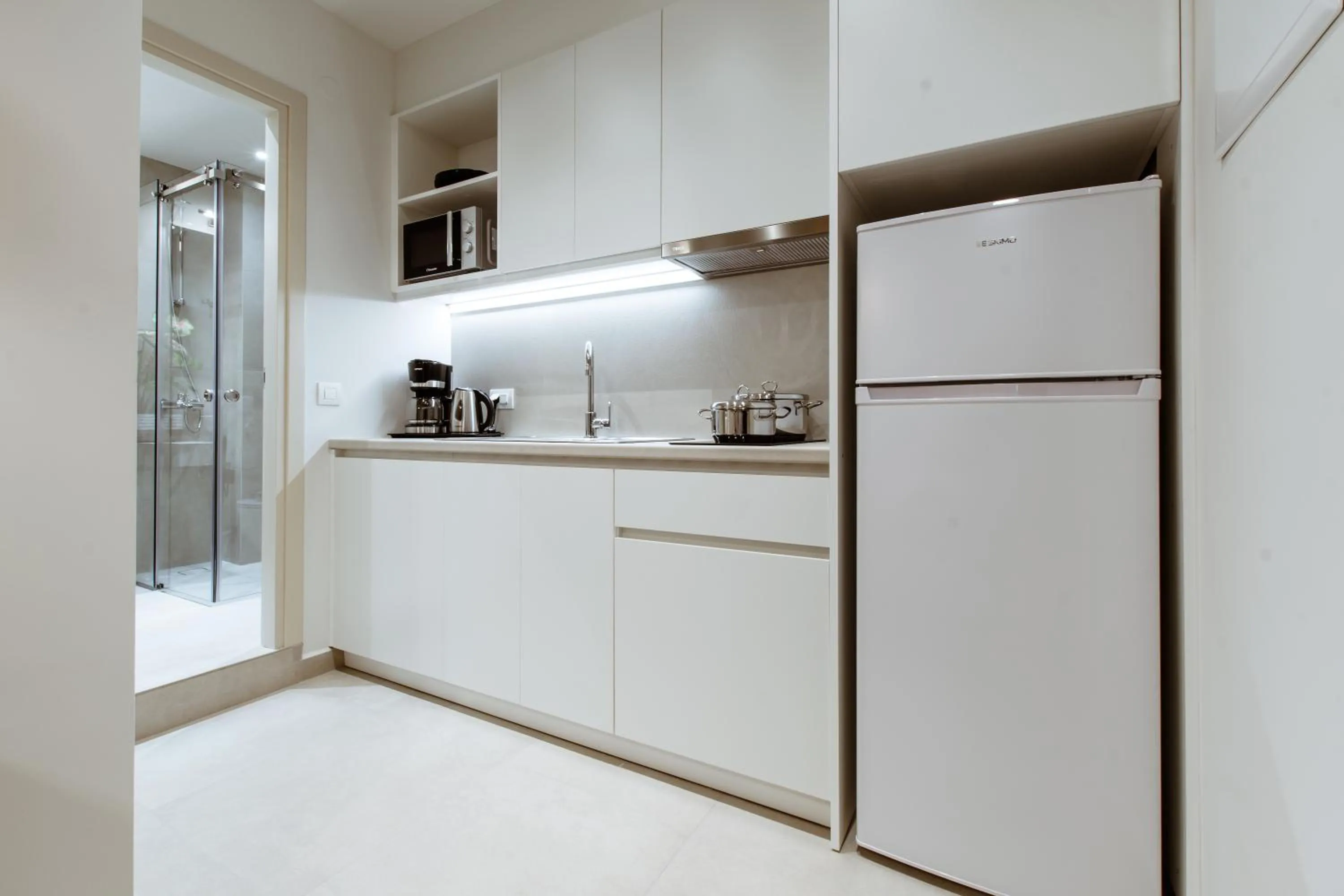 Kitchen or kitchenette in ANTEL Suites & Apartments