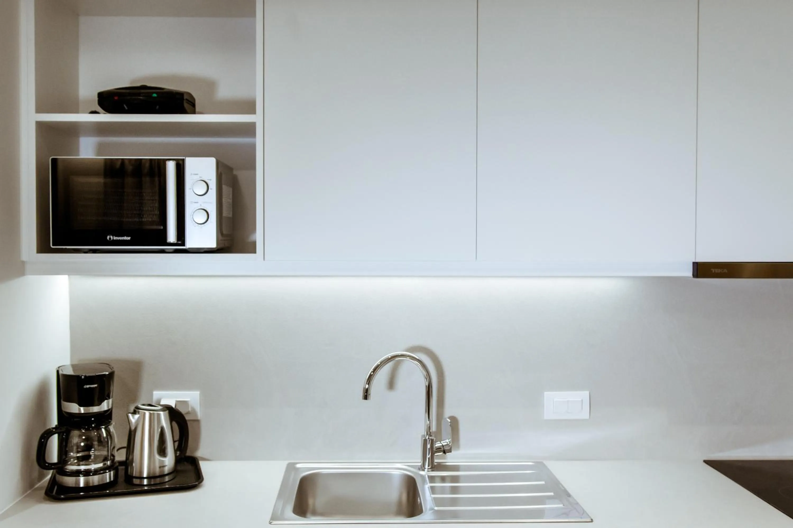 Kitchen or kitchenette in ANTEL Suites & Apartments