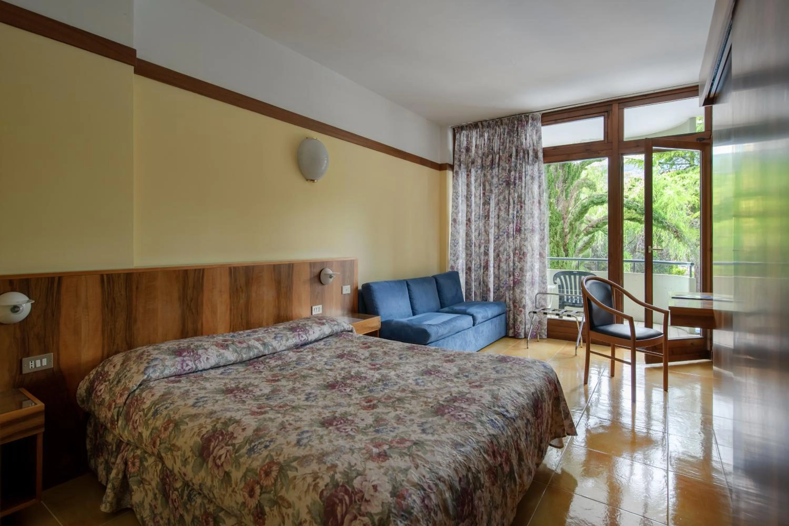 Bed in Hotel Palme & Suite