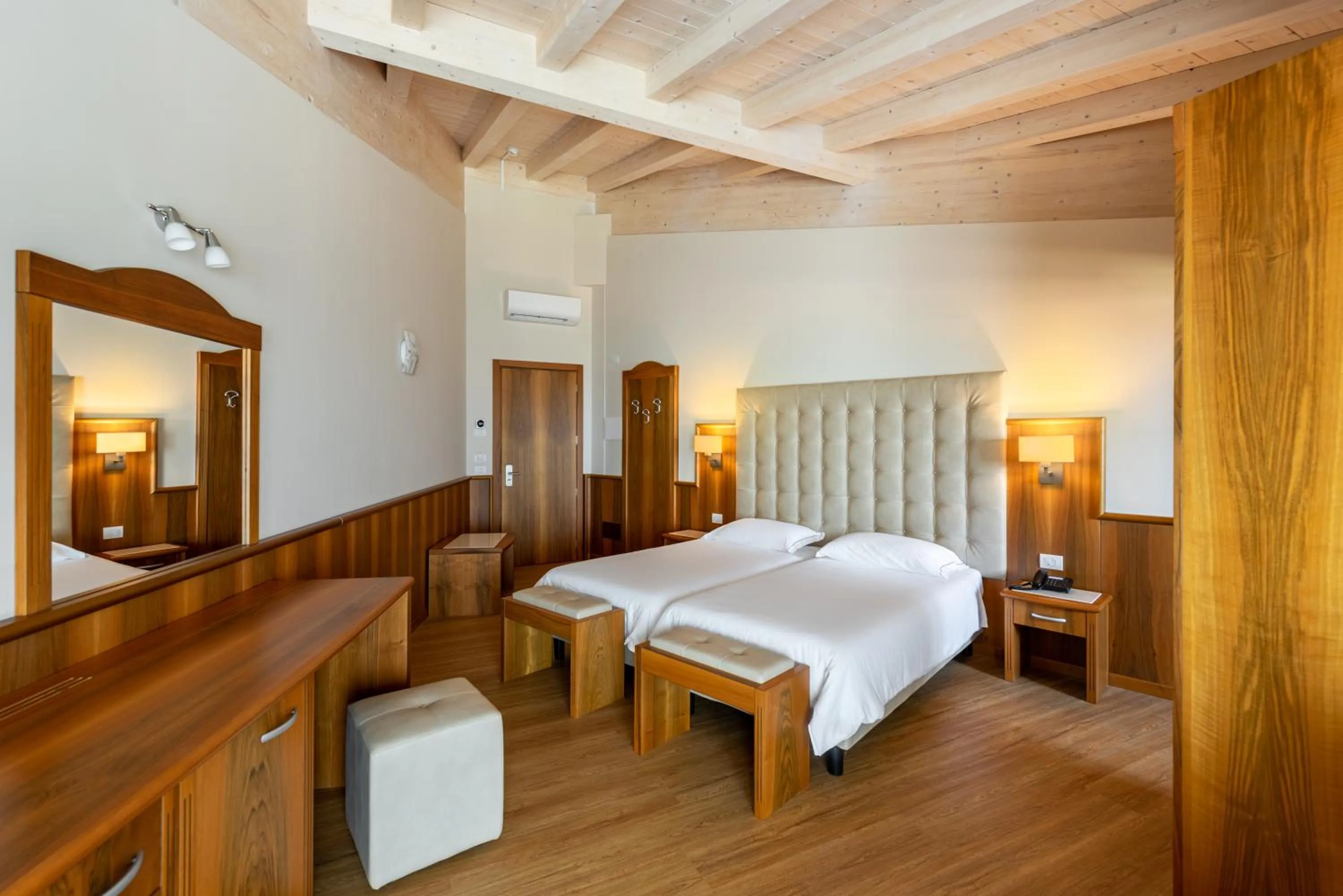 Bed in Hotel Palme & Suite