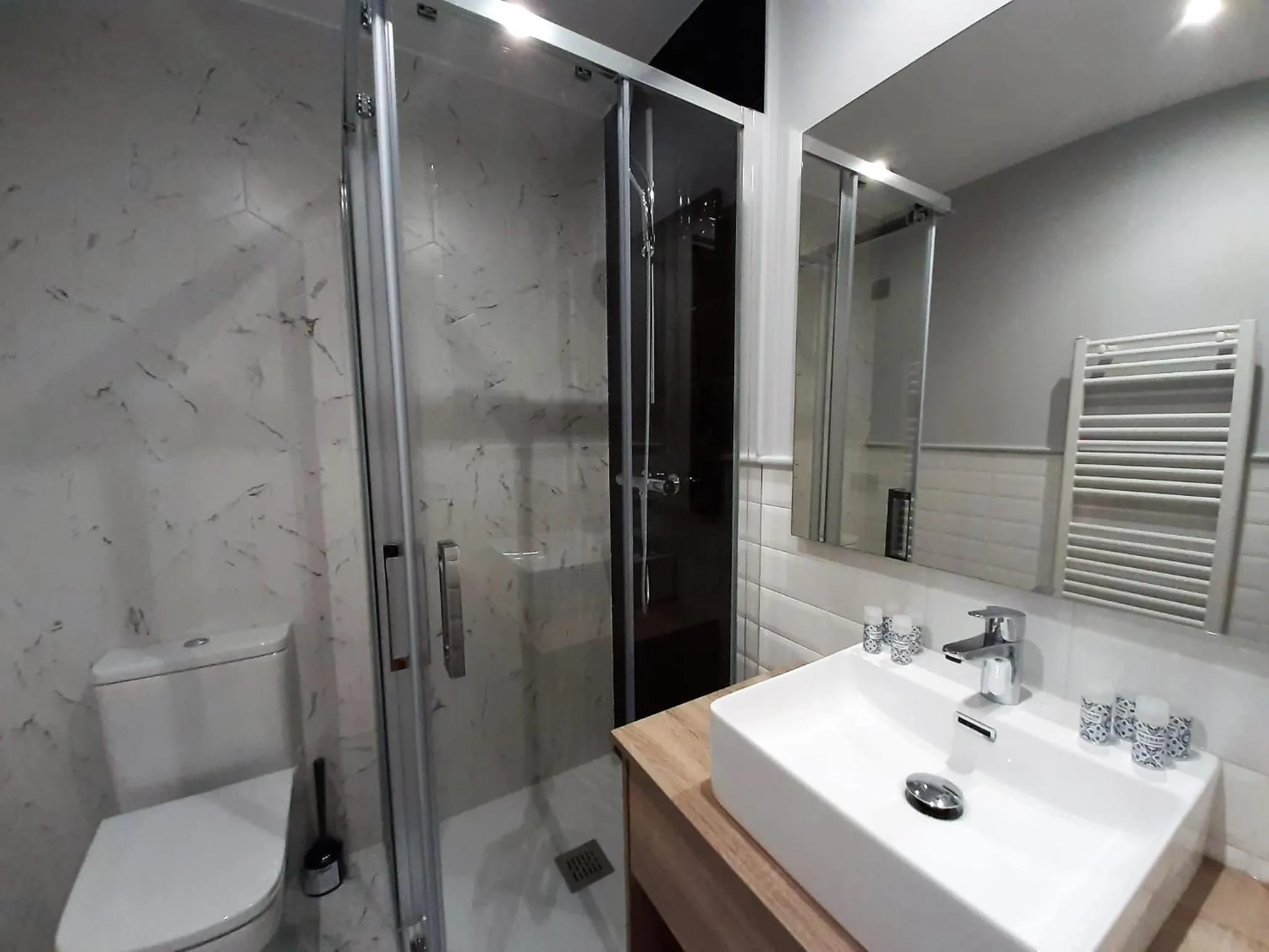 Shower in Apartamentos Celestina by gaiarooms