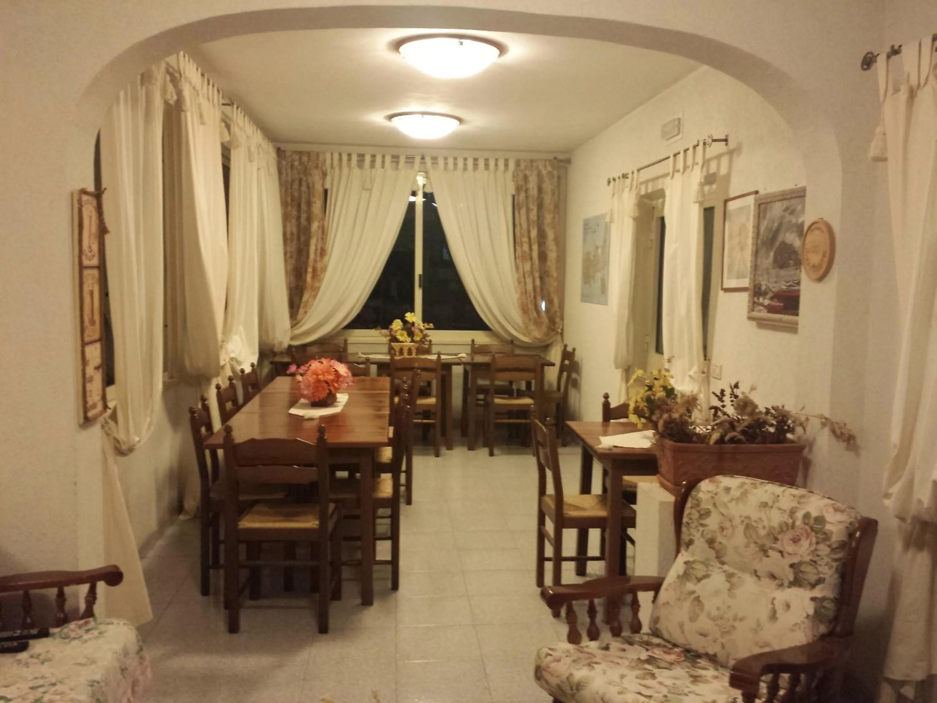 Communal lounge/ TV room in Baia Azzurra