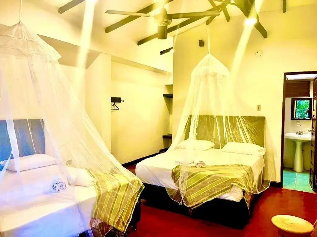 Family Room with Bathroom in Hotel Minca - La Casona Family Room with Bathroom in Hotel Minca - La Casona