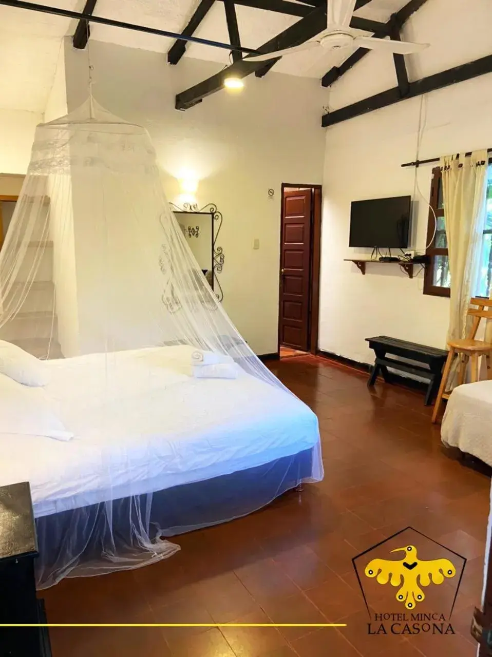 Deluxe Triple Room in Hotel Minca - La Casona Deluxe Triple Room in Hotel Minca - La Casona