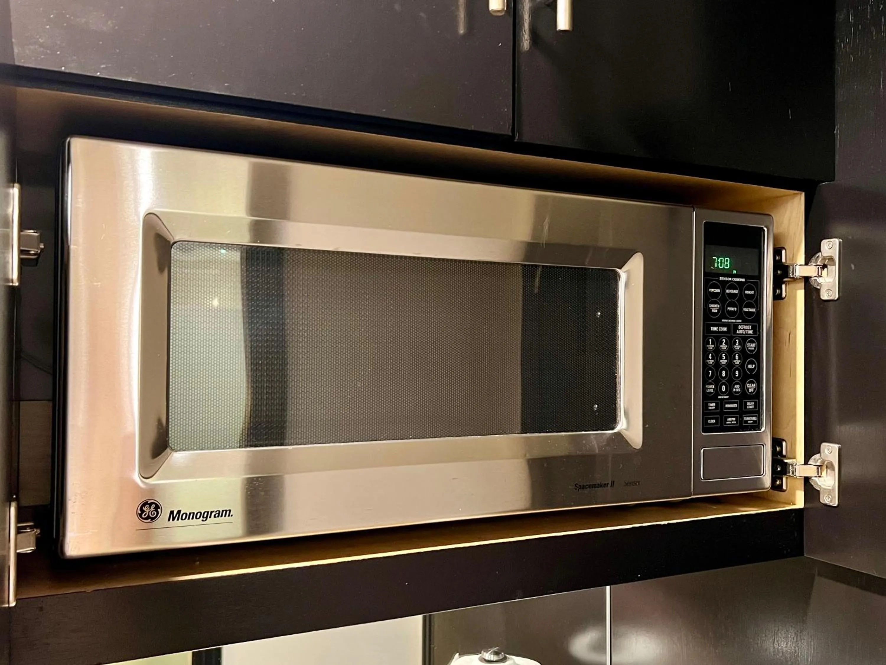 microwave in Boutique Suites 3 min walk to beach