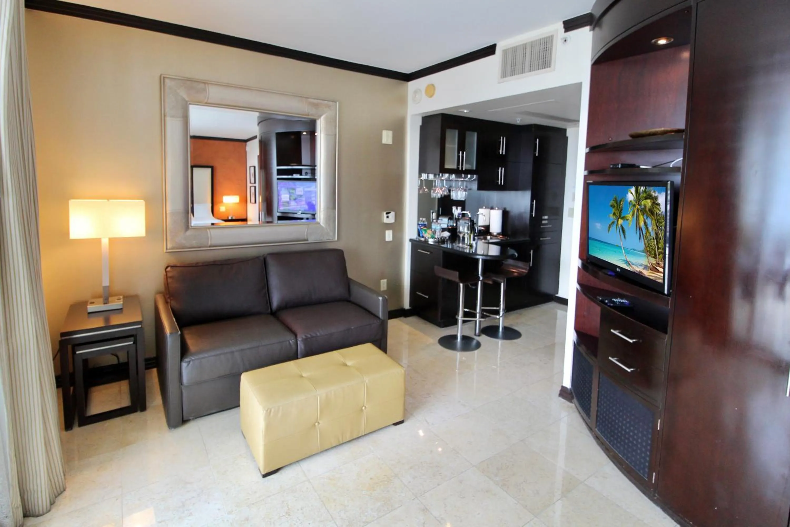 TV and multimedia in Boutique Suites 3 min walk to beach