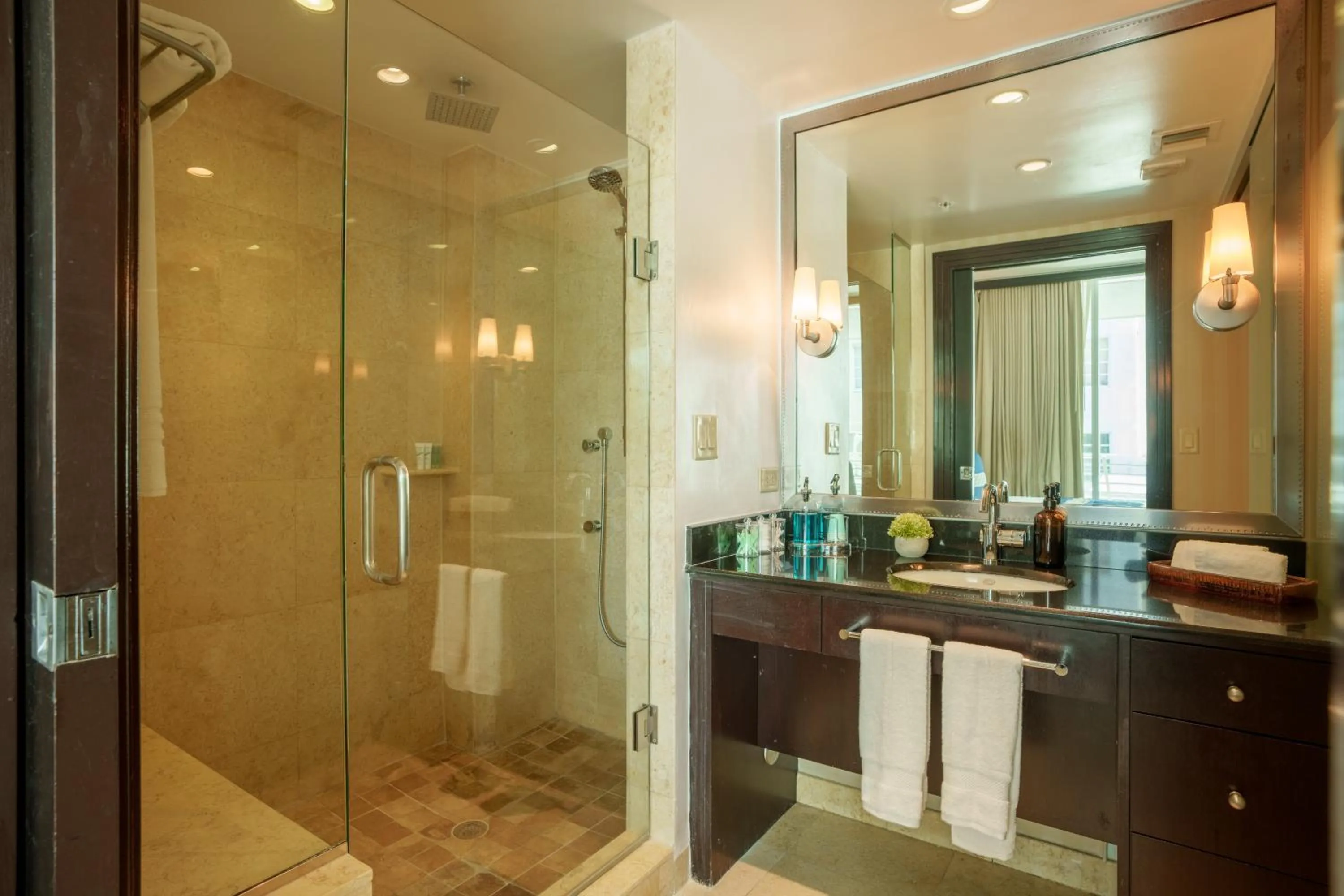 Shower in Boutique Suites 3 min walk to beach