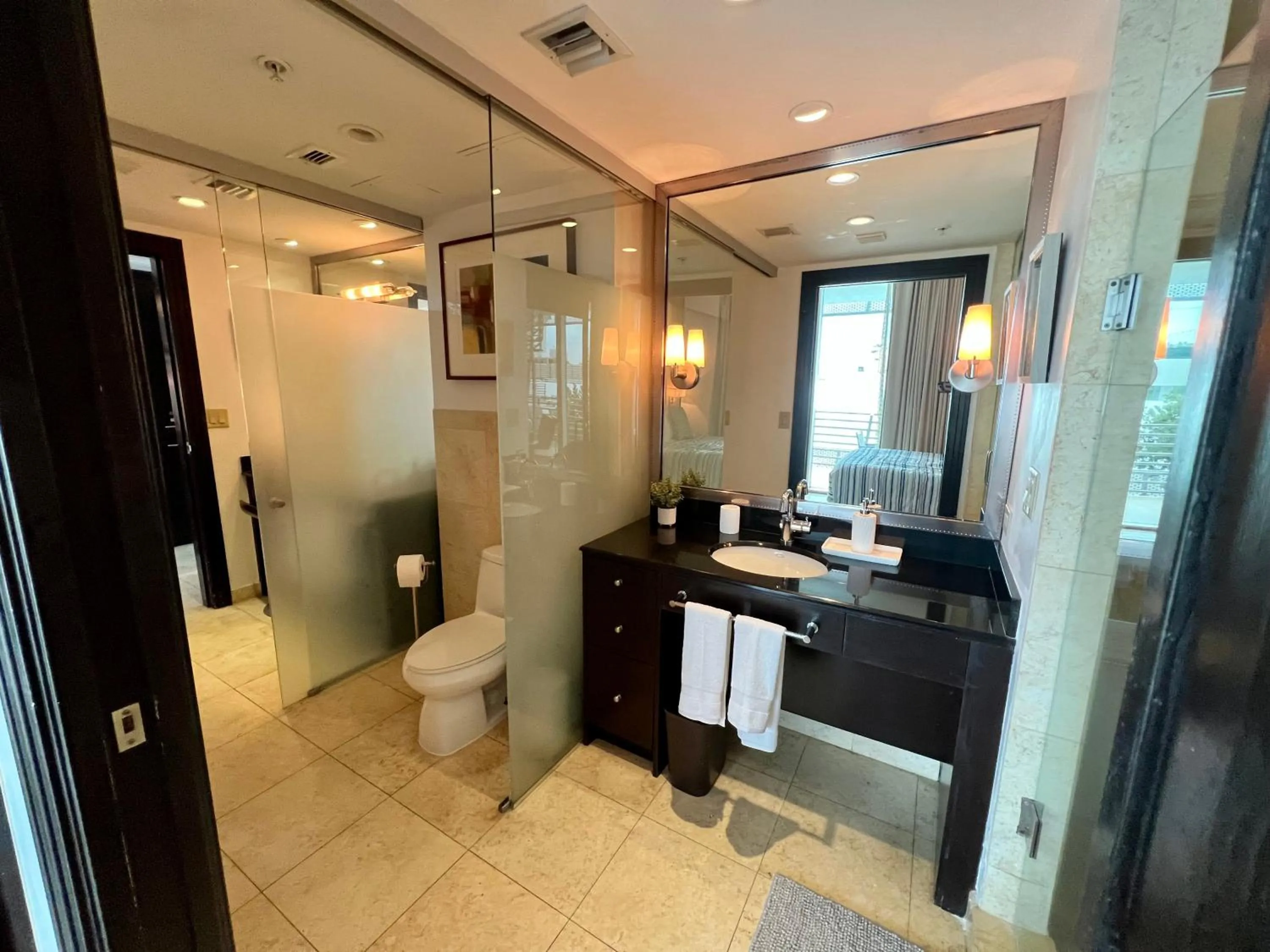 Shower in Boutique Suites 3 min walk to beach