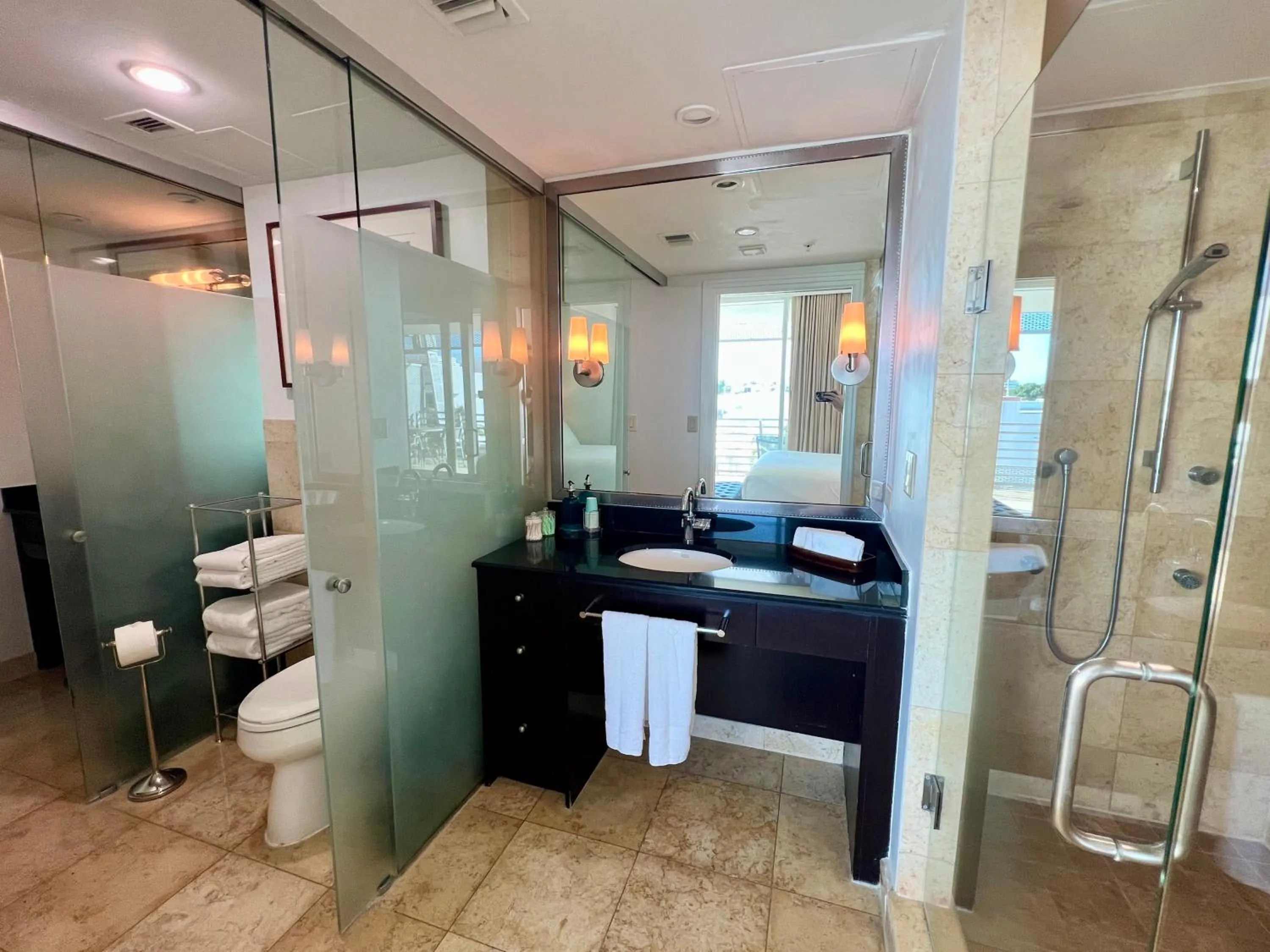 Shower in Boutique Suites 3 min walk to beach