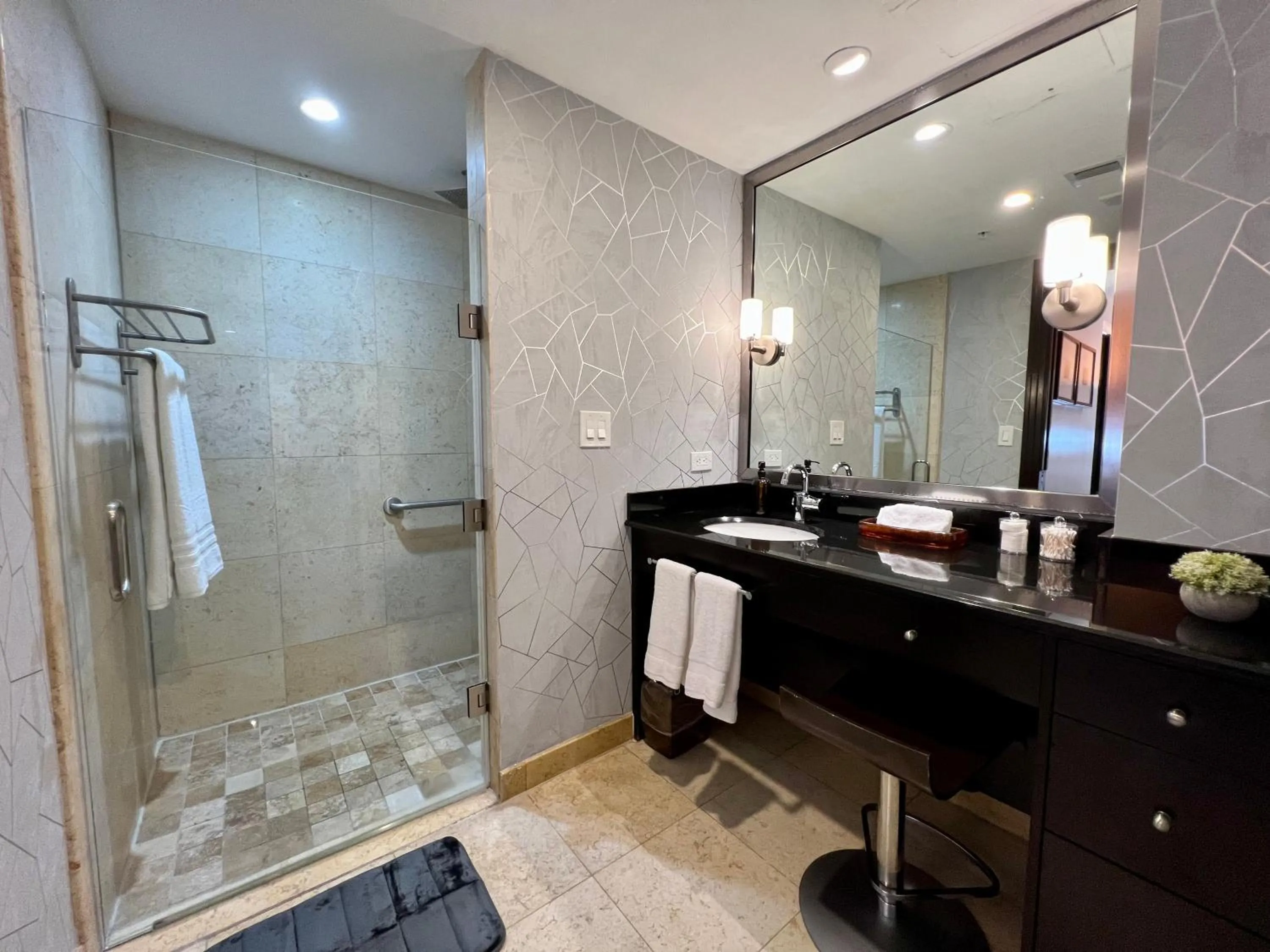 Shower in Boutique Suites 3 min walk to beach