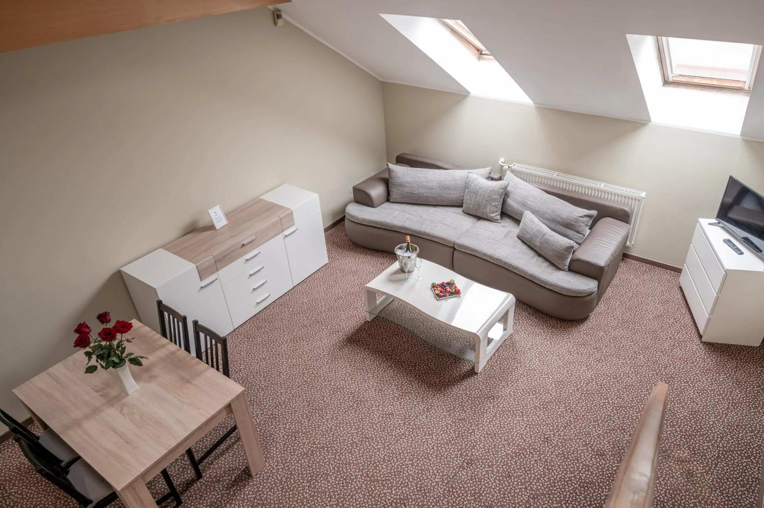 Living room, Bed in Hotel Brixen