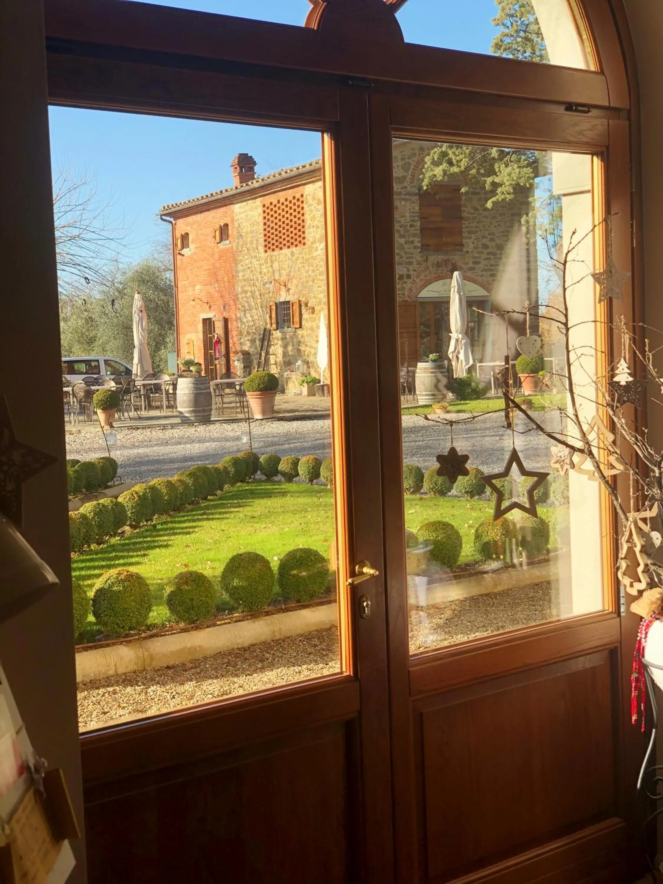 Garden view in La Cantina Relais - Fattoria Il Cipresso