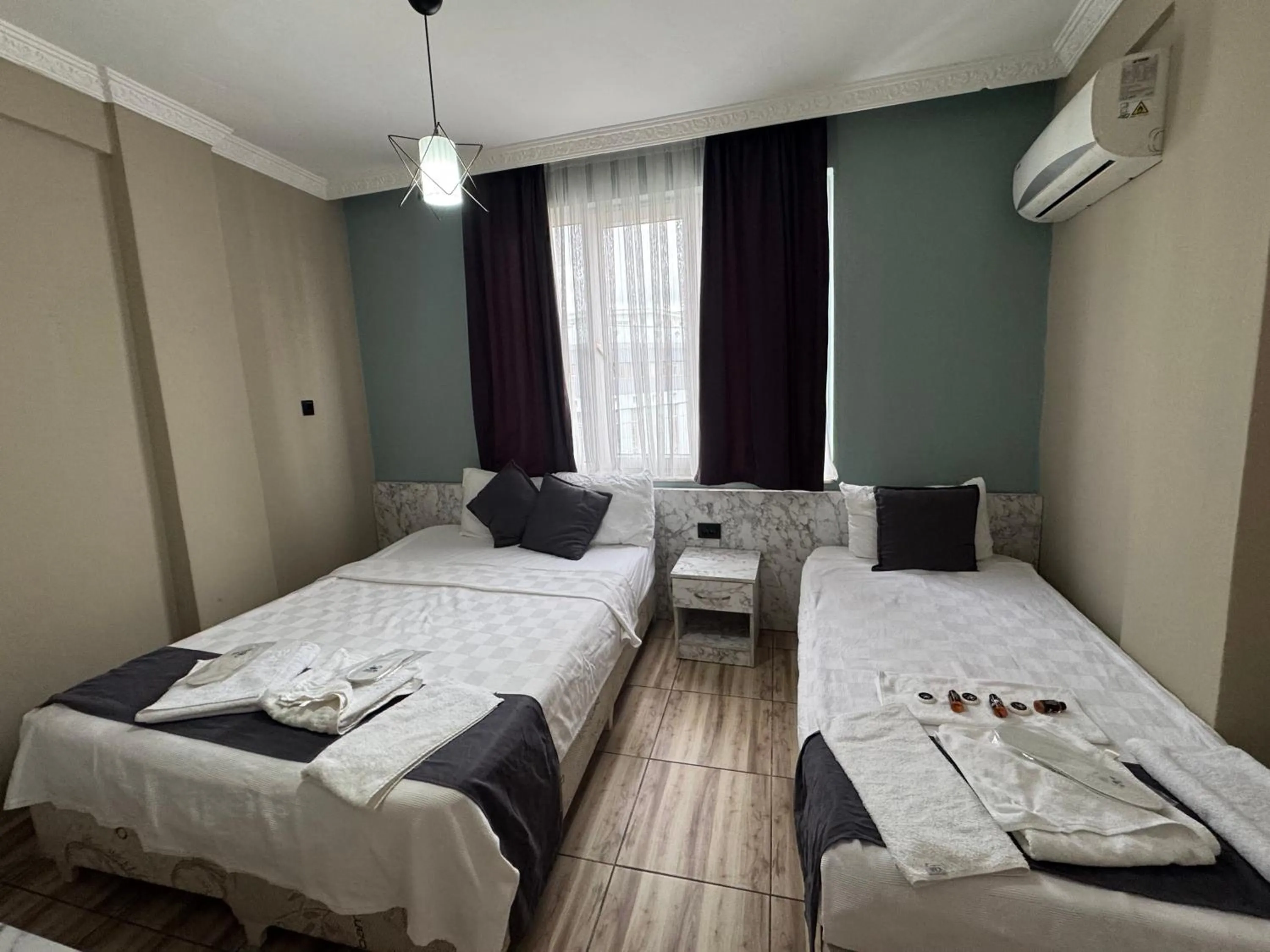 Bed in ERSOY EGE APART OTEL