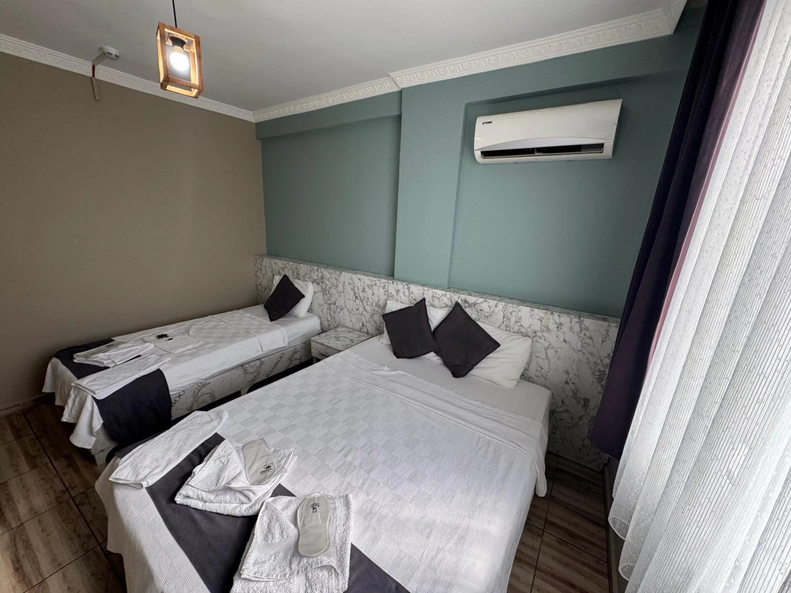 Bed in ERSOY EGE APART OTEL